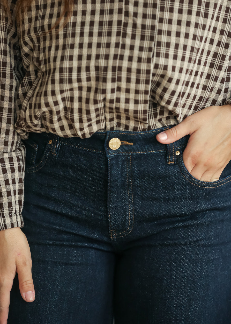Close view of dark wash Maya jeans with high-rise waist and front pocket