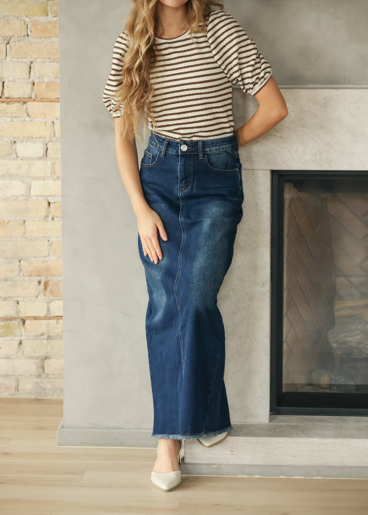 Brown striped tee and dark wash denim maxi skirt styled for an easy casual outfit.