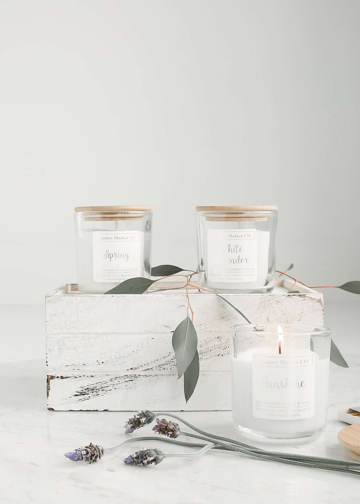 hand poured soy candles in a clear jar with bamboo lid