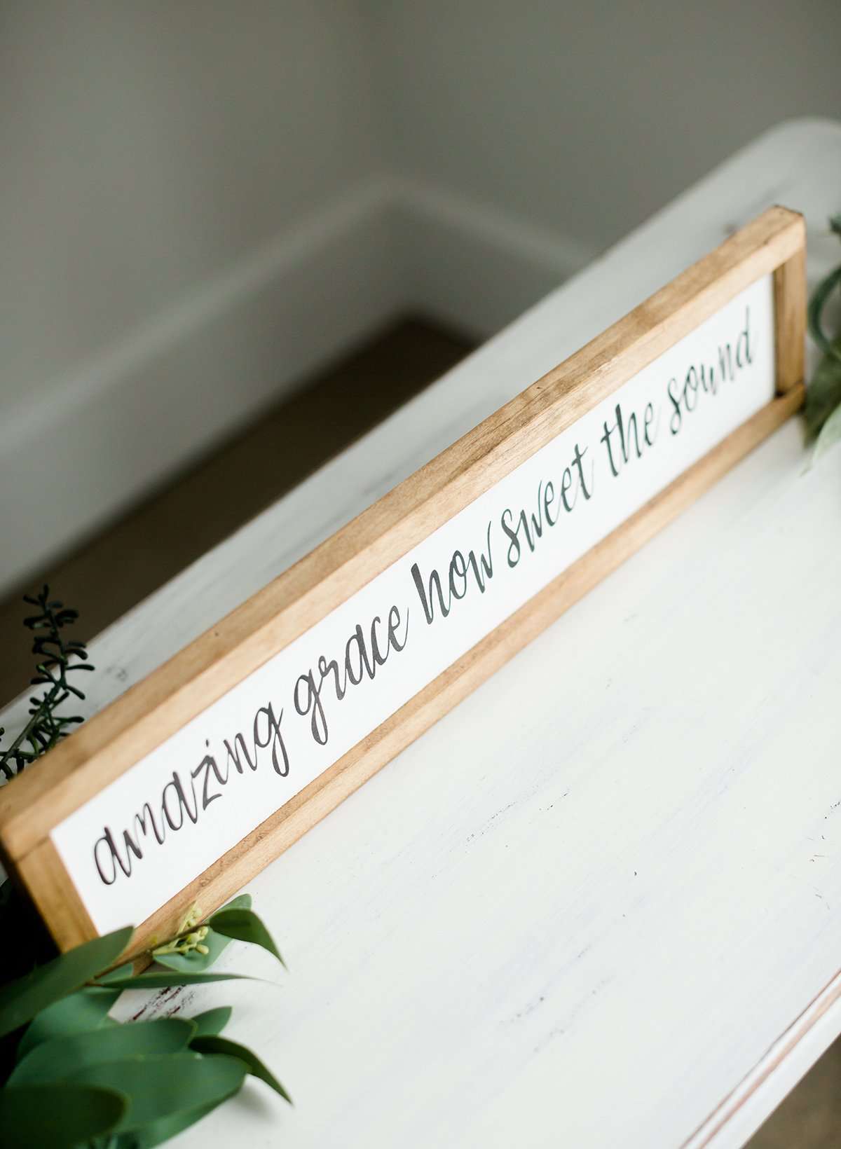 Wood Frame Signboard with the words, "amazing grace how sweet the sound"