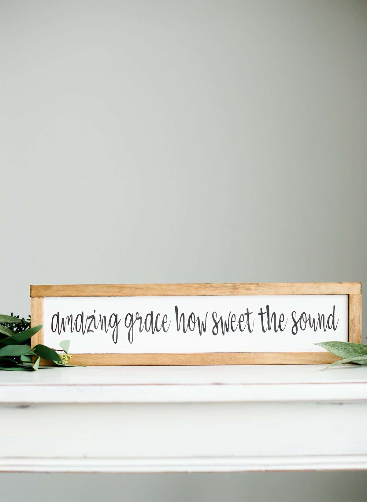 Wood Frame Signboard with the words, "amazing grace how sweet the sound"