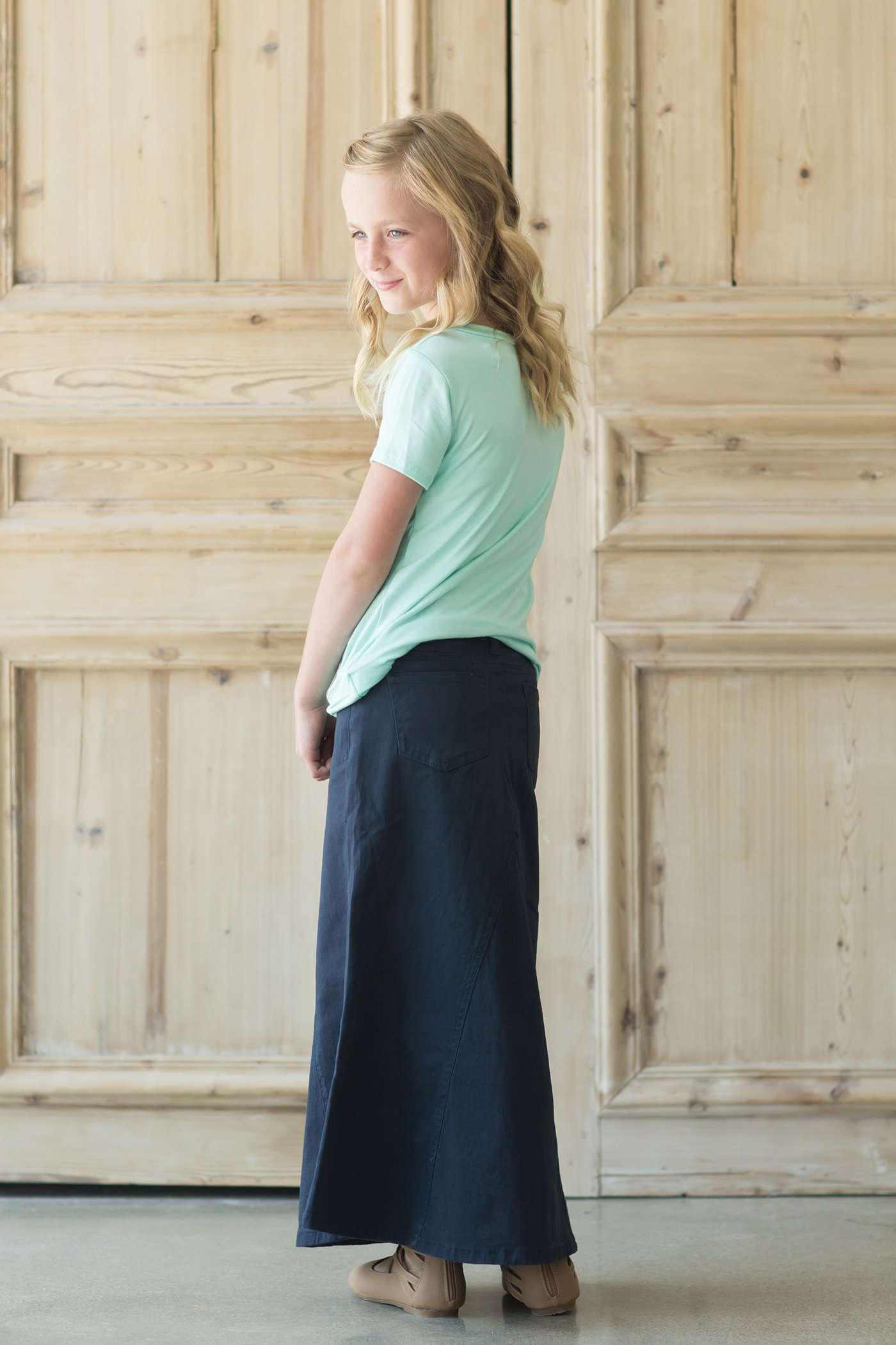 Modest girl's long navy skirt. A-line insert for a flowy, fun look.