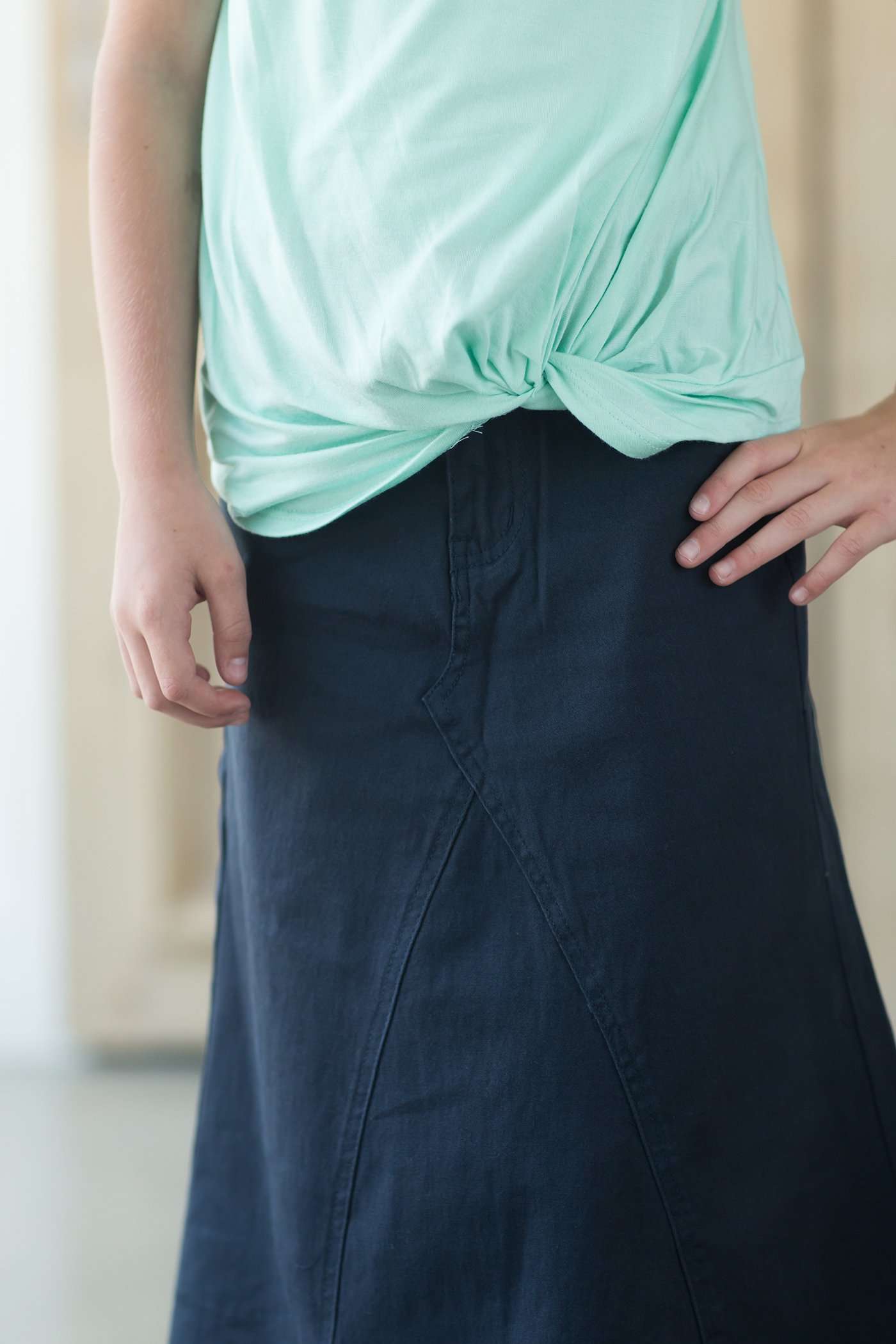 Modest girl's long navy skirt. A-line insert for a flowy, fun look.