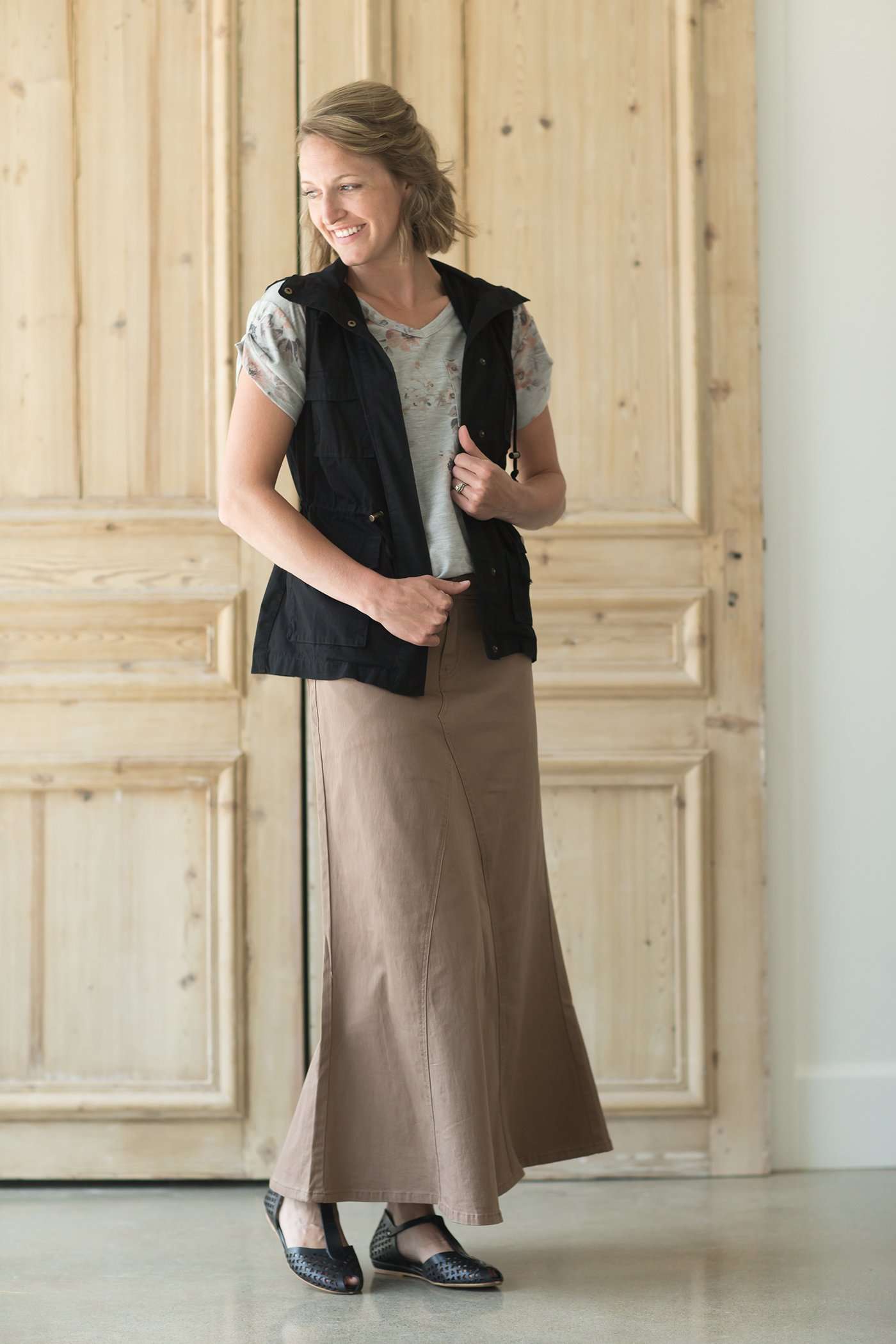 Shop this long, modest khaki twill skirt with a beautiful a-line insert.