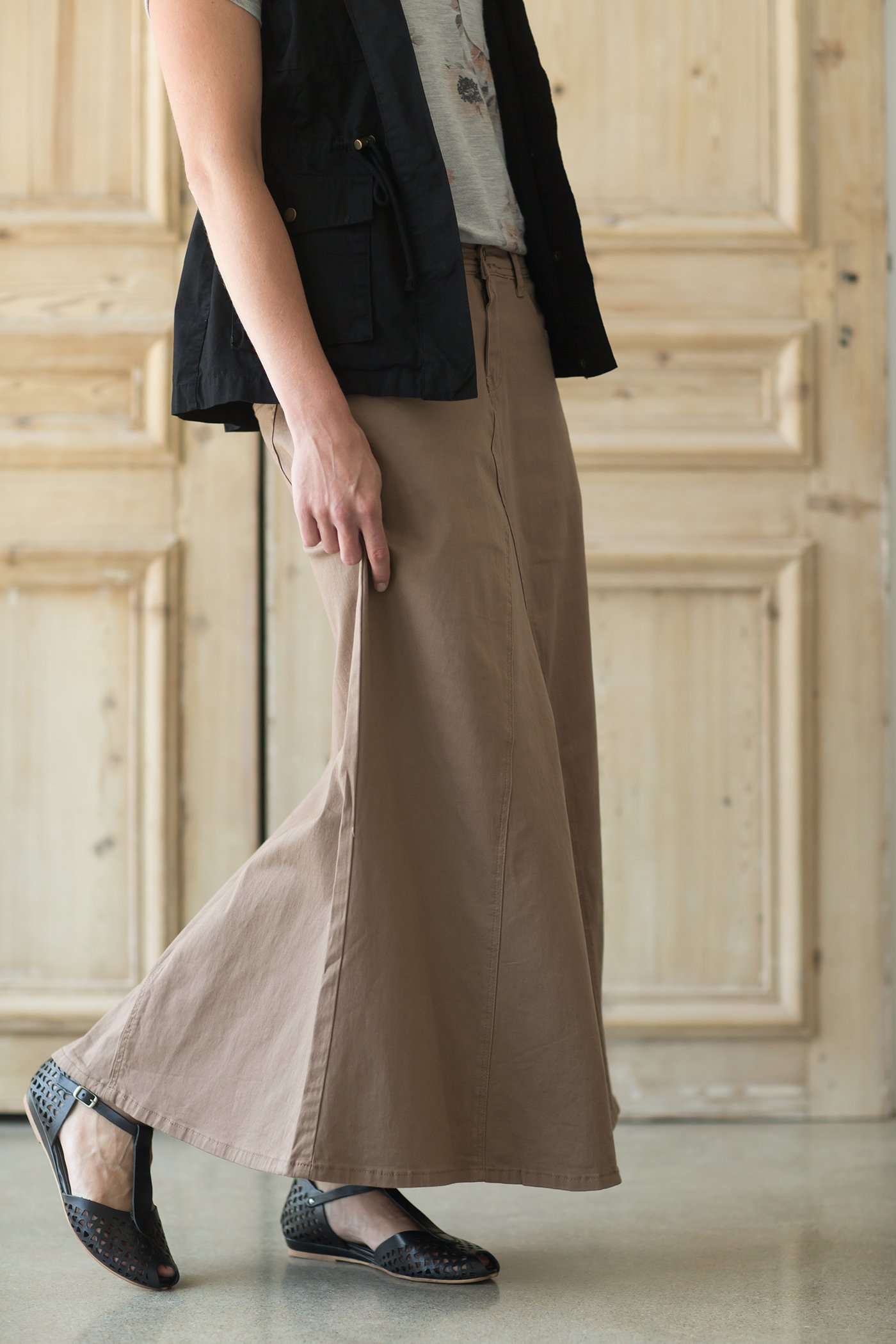 Shop this long, modest khaki twill skirt with a beautiful a-line insert.