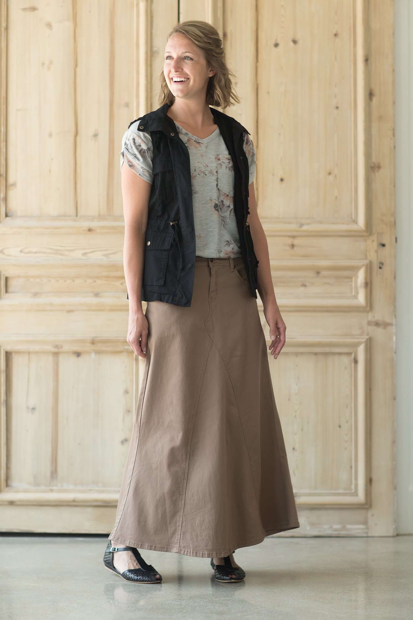 Shop this long, modest khaki twill skirt with a beautiful a-line insert.