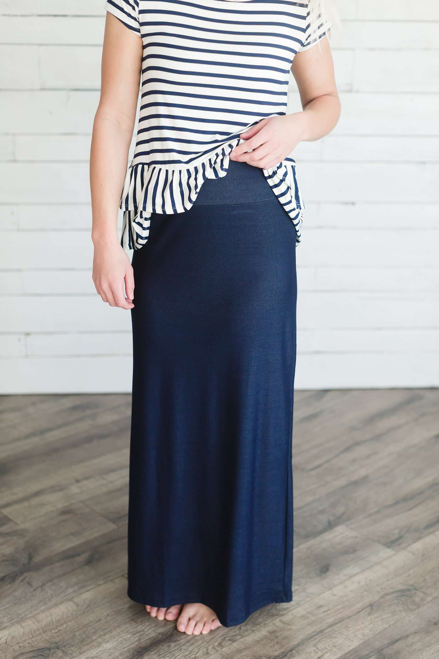Women's modest denim-like knit skirt in black or navy.