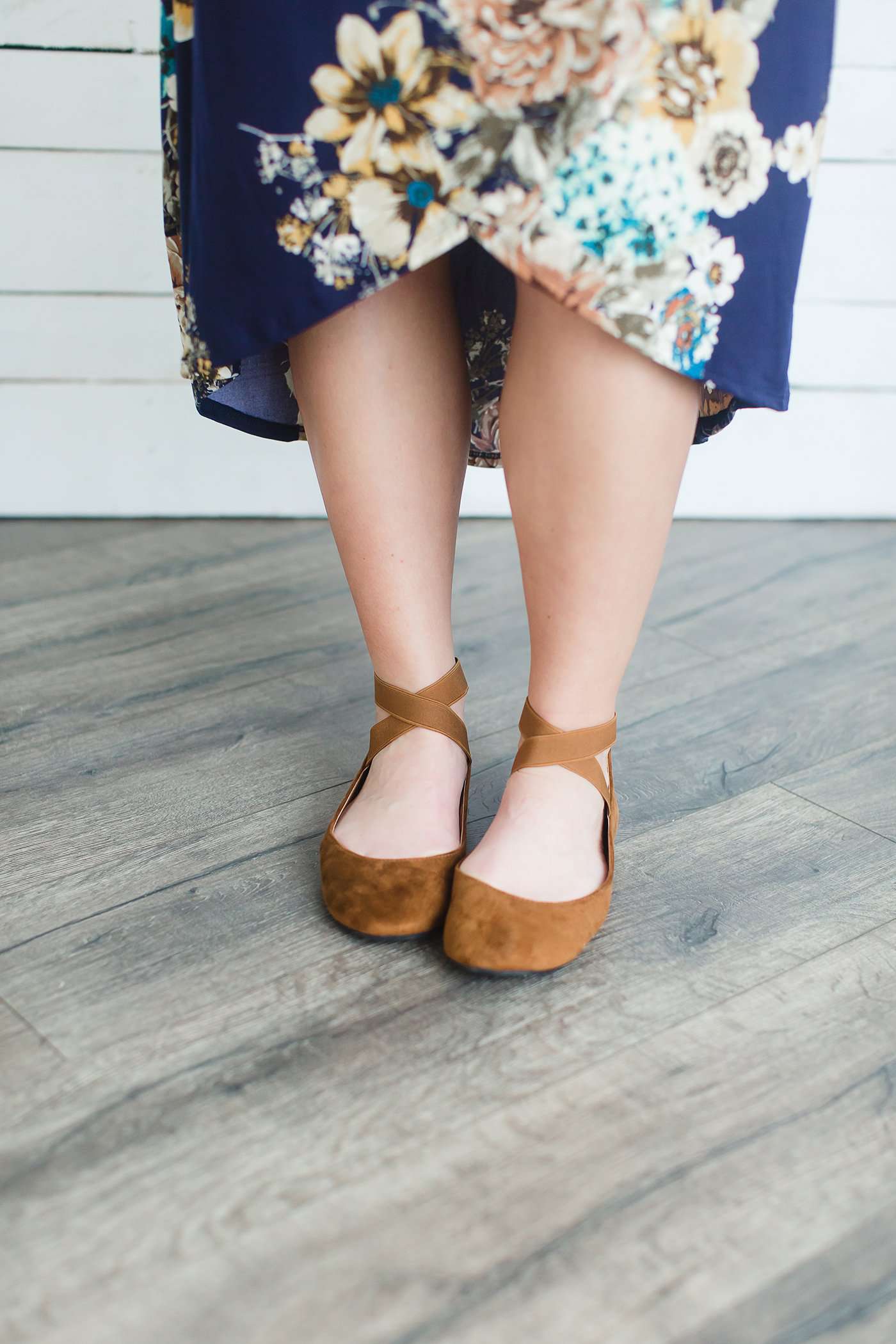 Black or tan ankle wrap faux suede ballet flats.