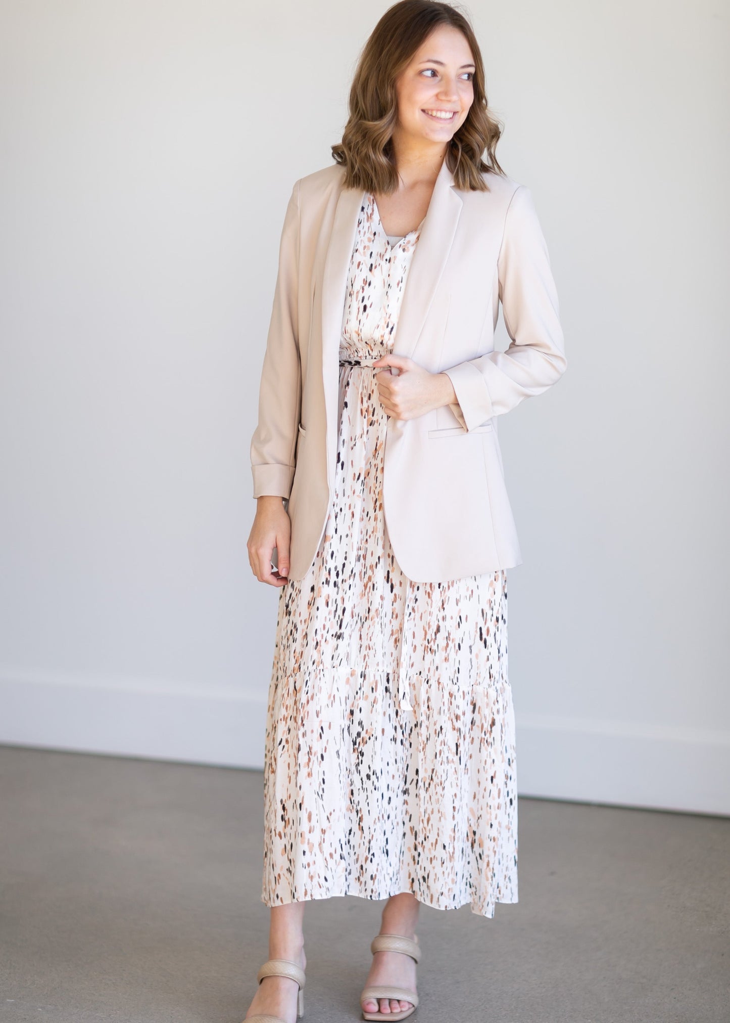 Basic Open Front Blazer features classic lapel collar, rolled up cuffs, and flat front hip pockets. This blazer is lined for a sleek fit.