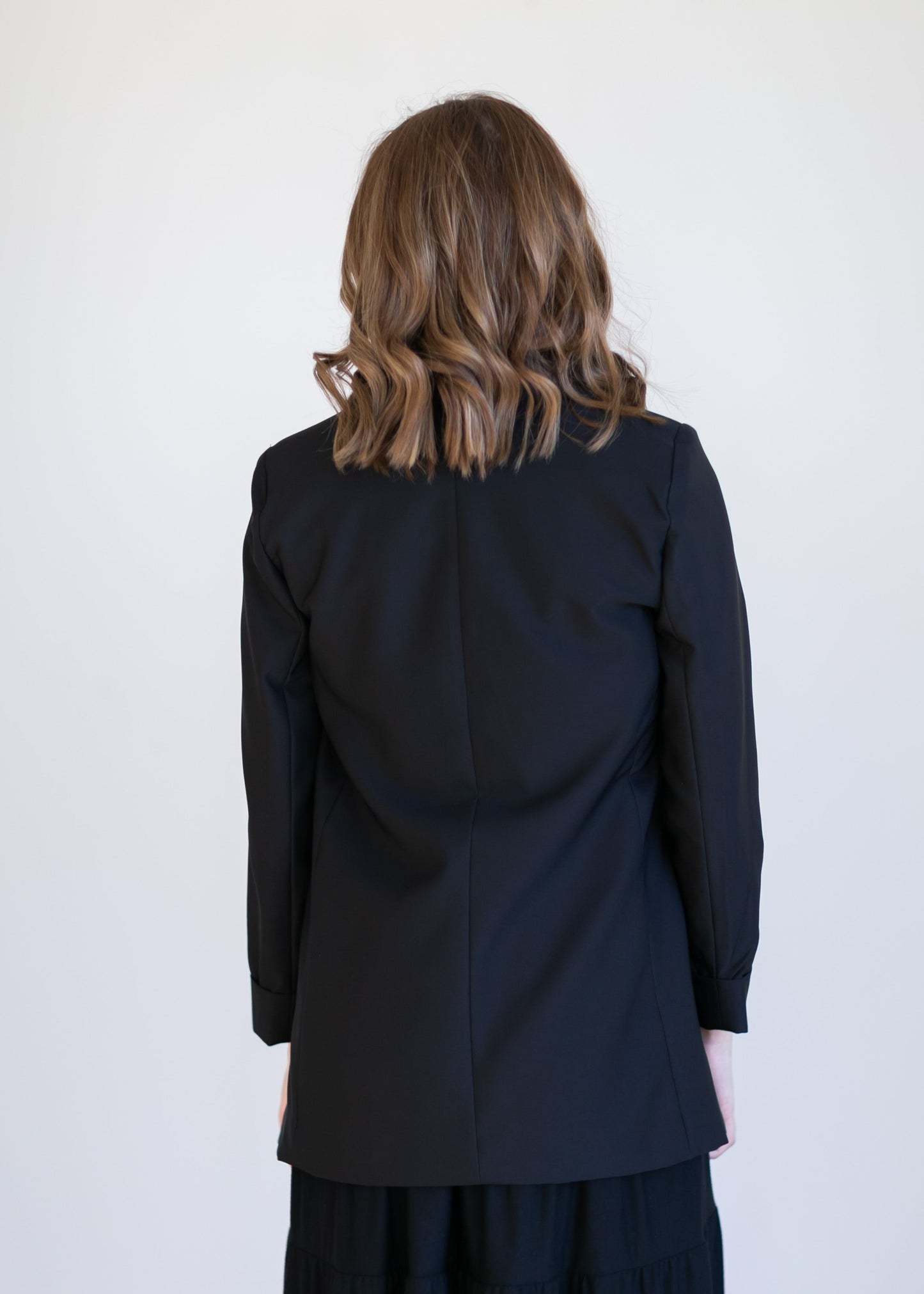 Basic Open Front Blazer features classic lapel collar, rolled up cuffs, and flat front hip pockets. This blazer is lined for a sleek fit.