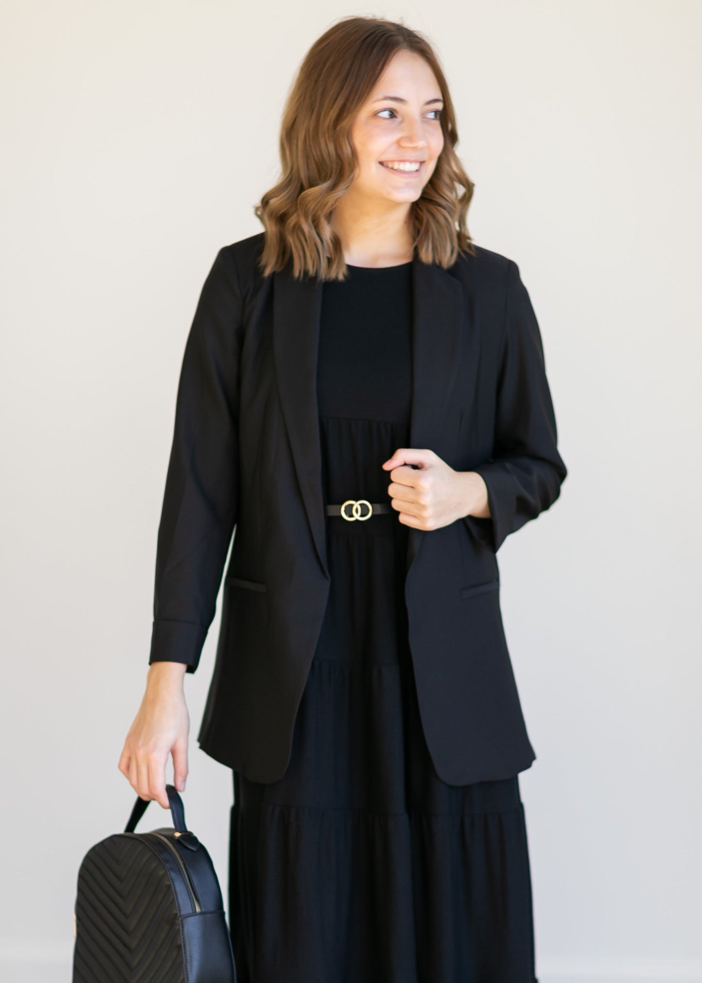 Basic Open Front Blazer features classic lapel collar, rolled up cuffs, and flat front hip pockets. This blazer is lined for a sleek fit.