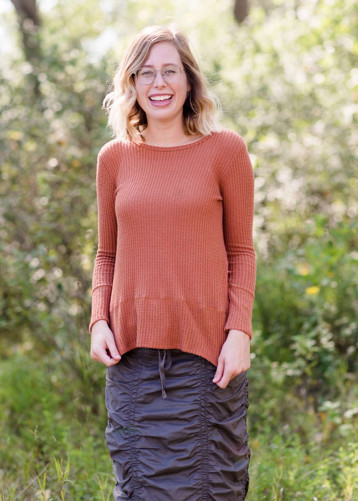 Brick in color, lightweight waffle knit long sleeve top.