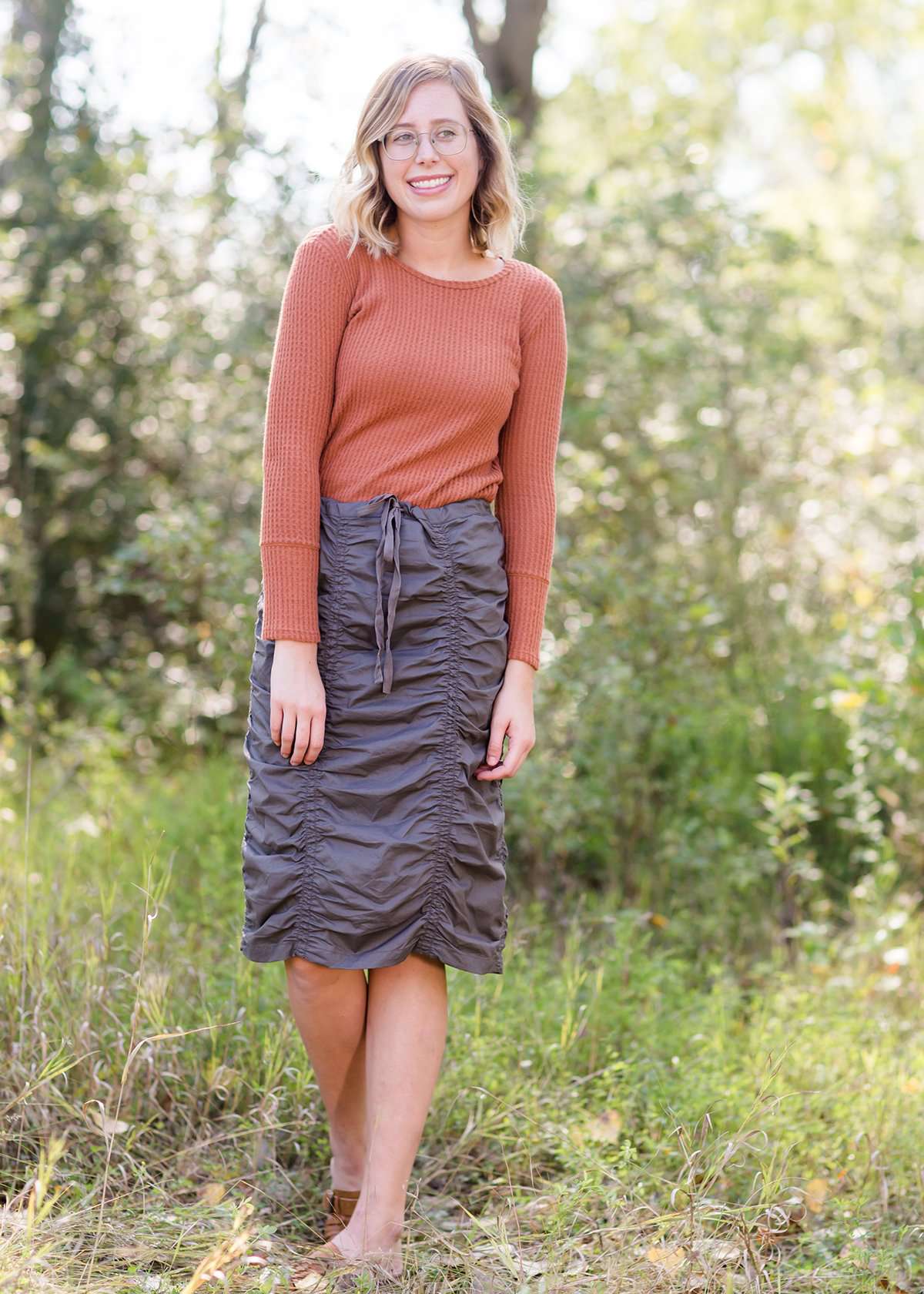 Brick in color, lightweight waffle knit long sleeve top.