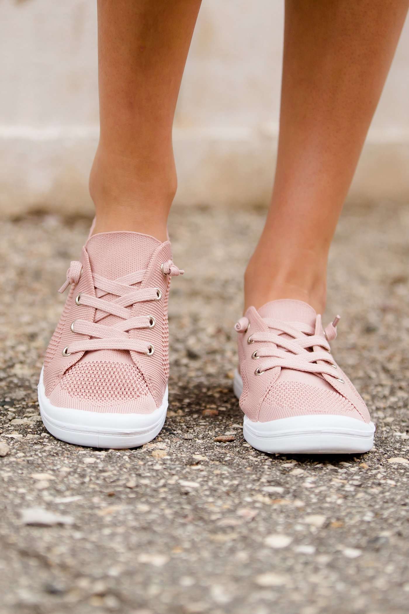 Blush or grey option mesh slip on, laced up shoe. Either color has a white sole.