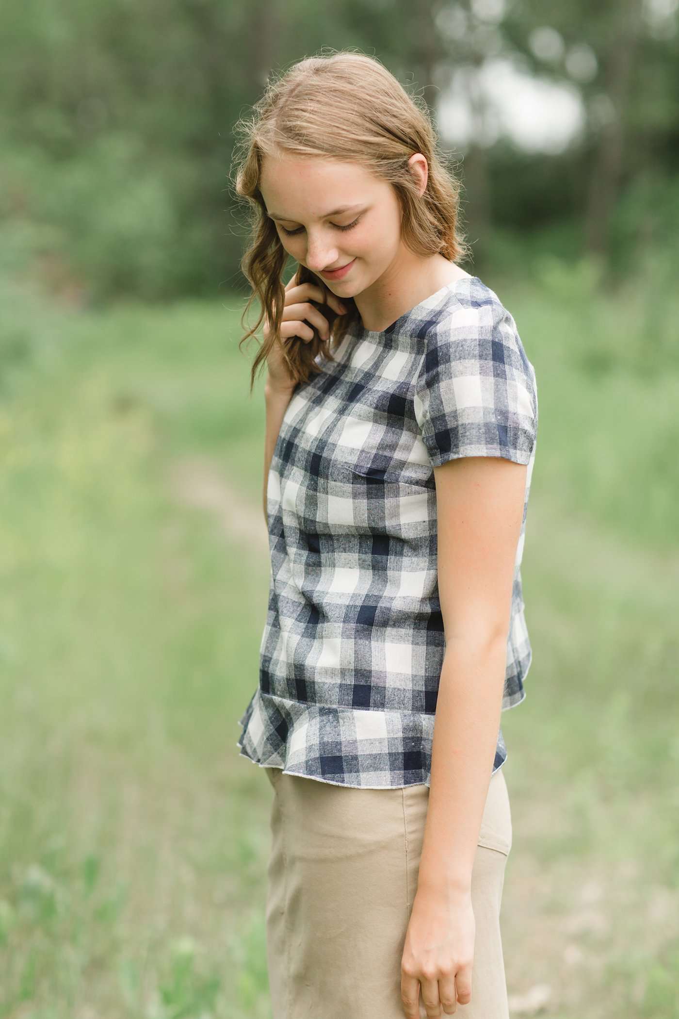 Red or Navy checked country plaid short sleeve top with ruffle back and bottom.