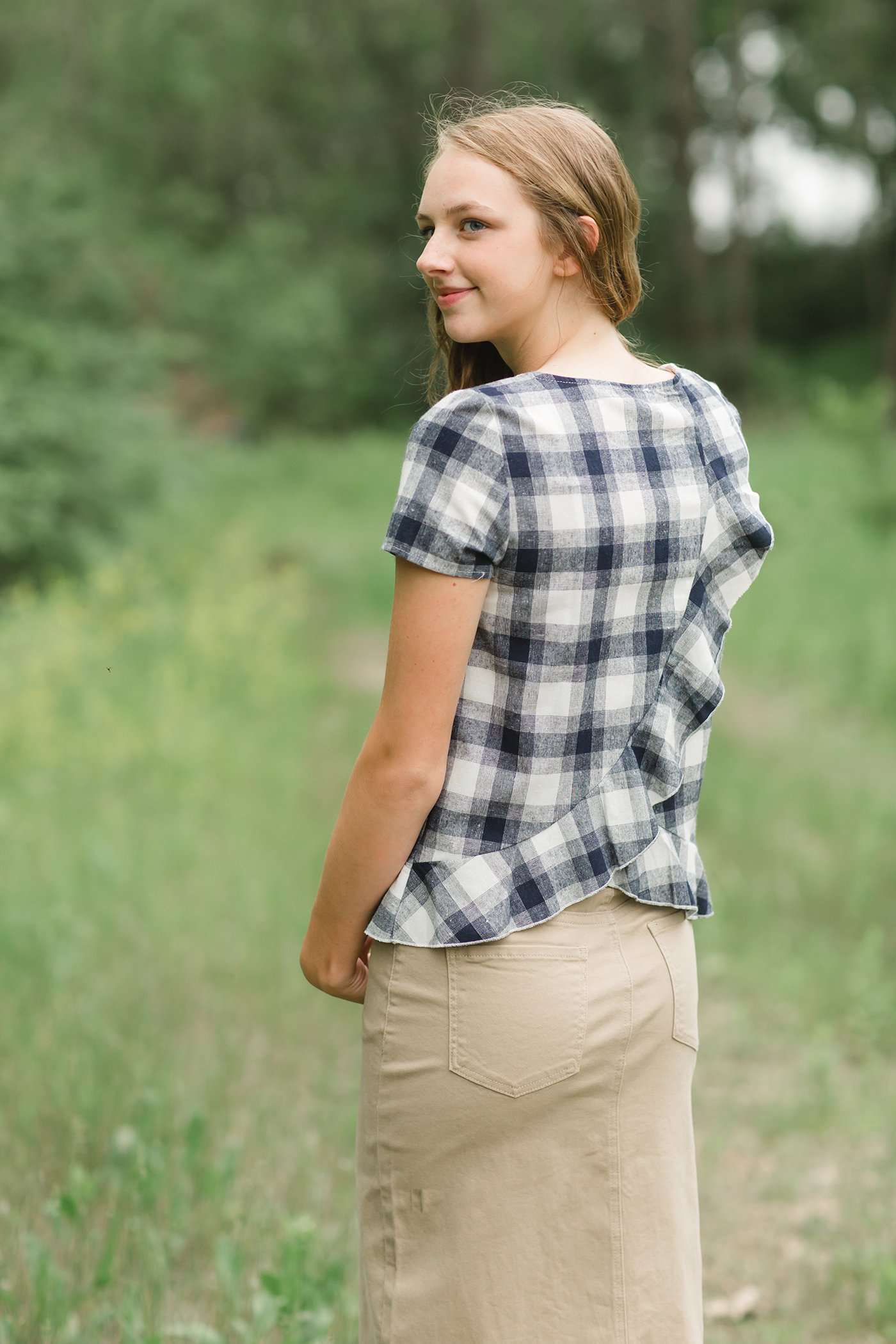 Red or Navy checked country plaid short sleeve top with ruffle back and bottom.