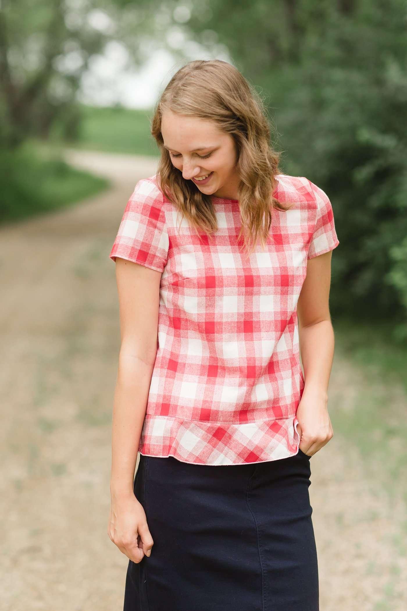 Red or Navy checked country plaid short sleeve top with ruffle back and bottom.
