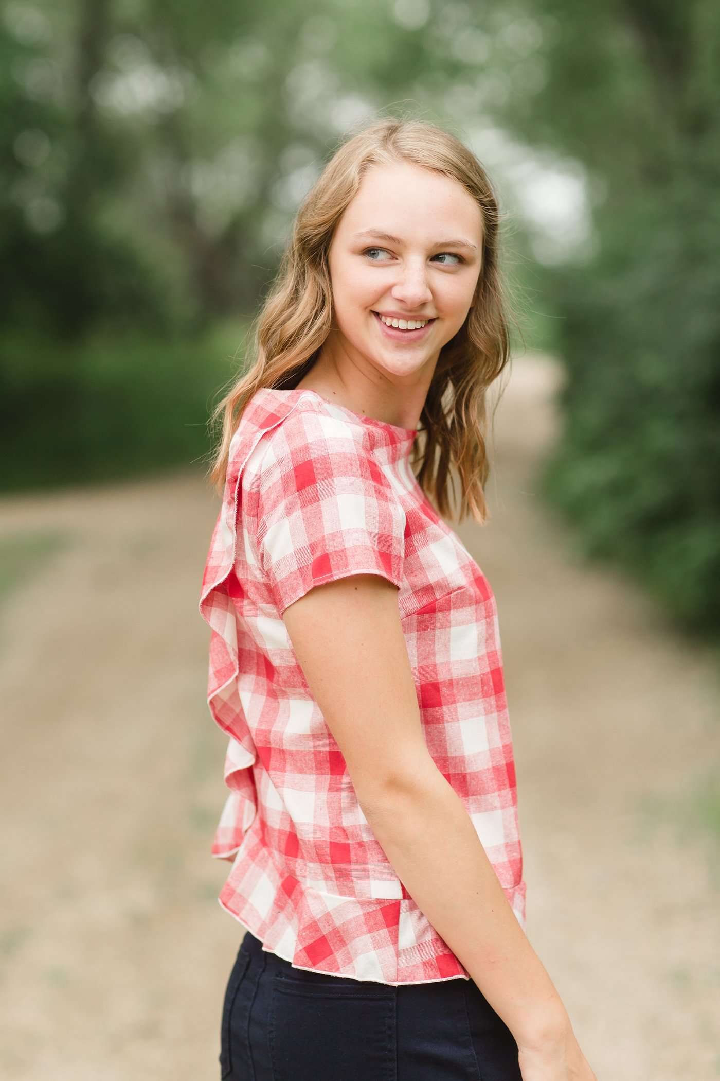 Red or Navy checked country plaid short sleeve top with ruffle back and bottom.