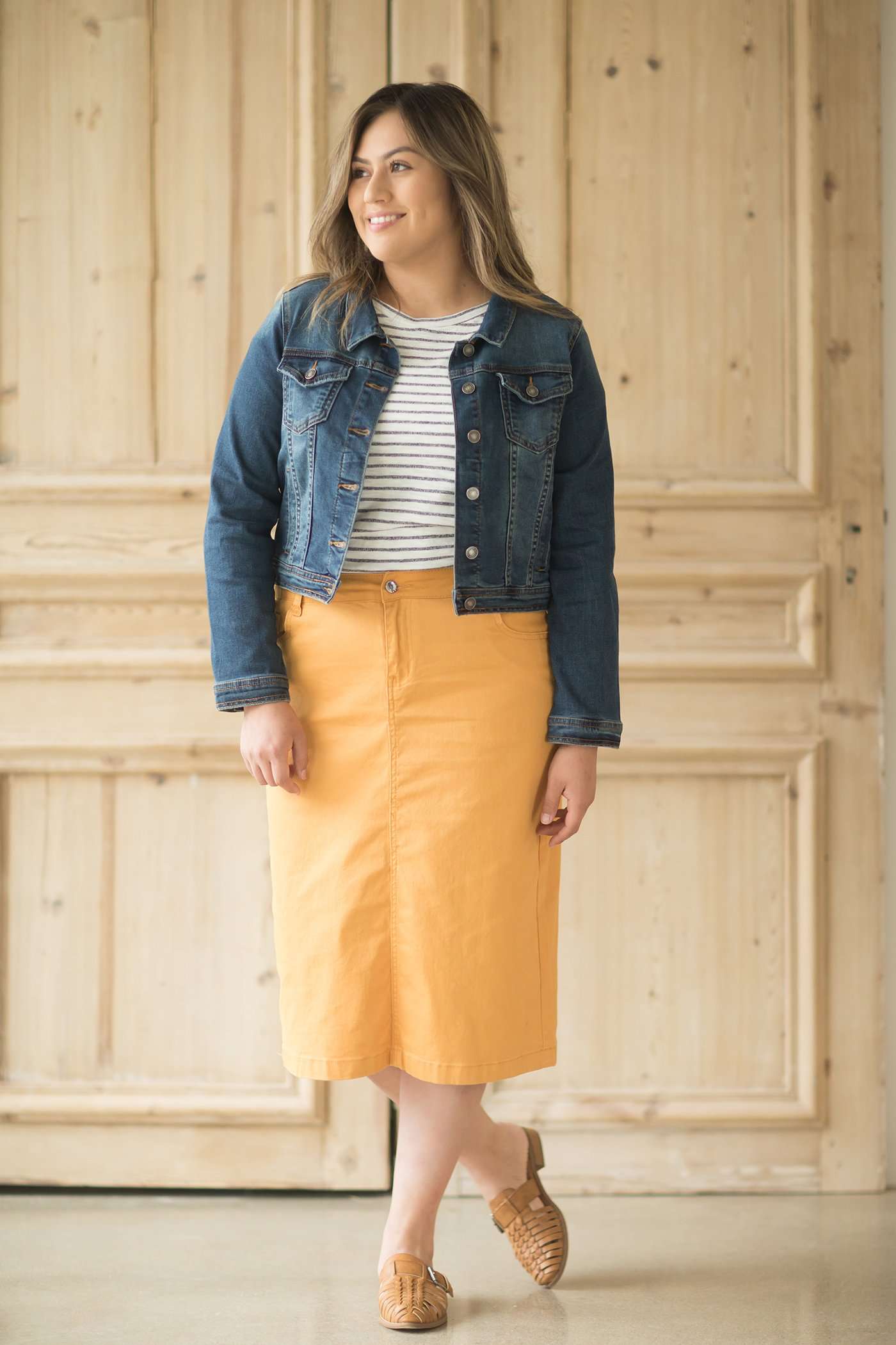 Dandelion colored denim skirt below the knee.