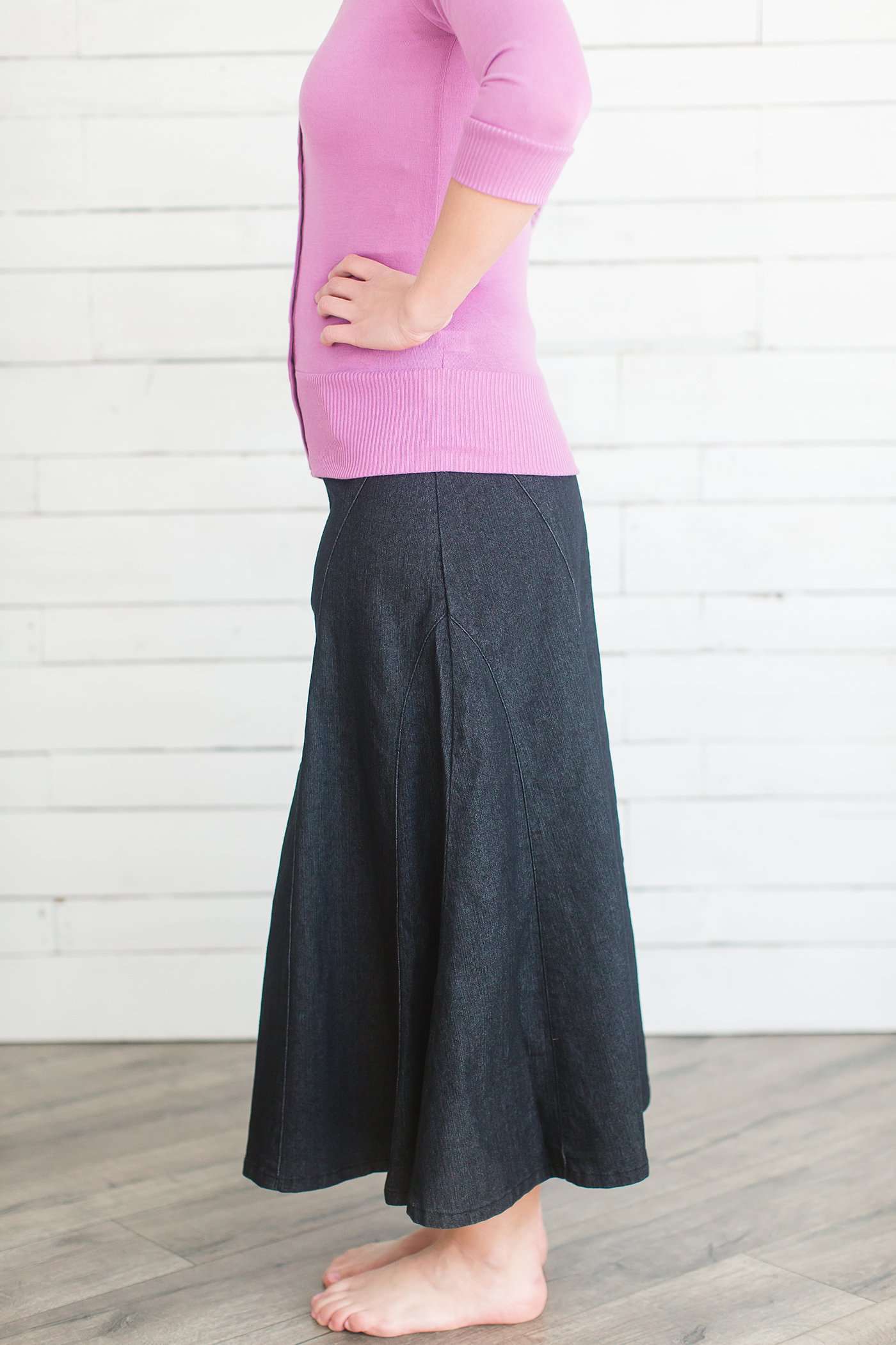 Ankle length flare black dye cotton side zip skirt.
