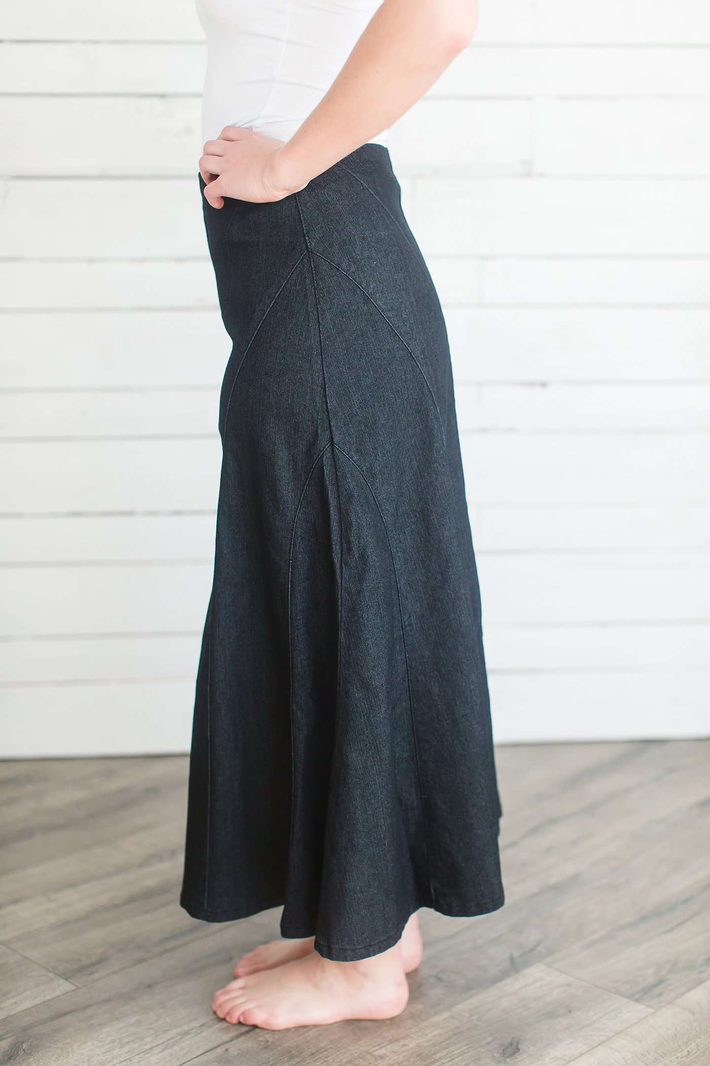 Ankle length flare black dye cotton side zip skirt.