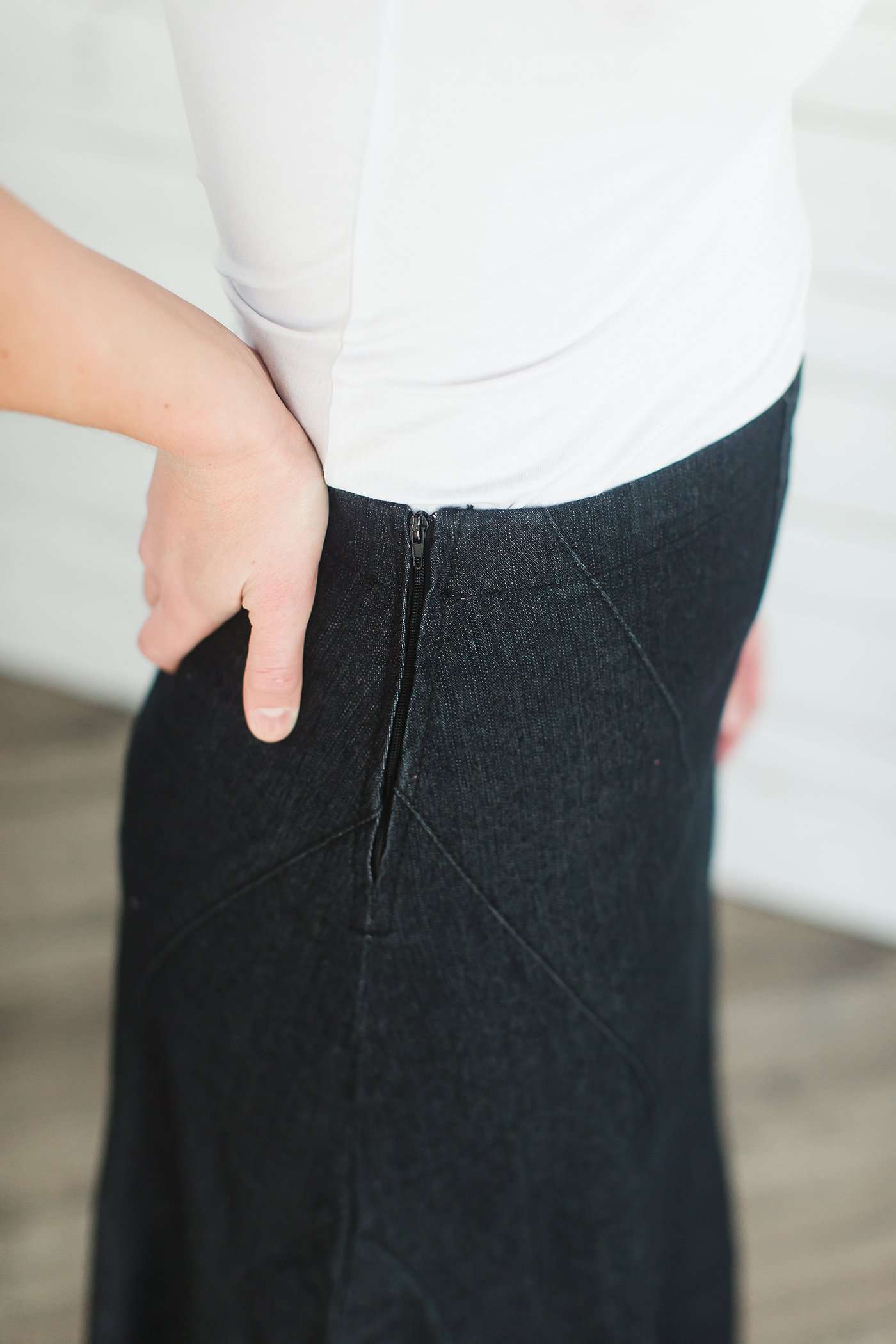 Ankle length flare black dye cotton side zip skirt.