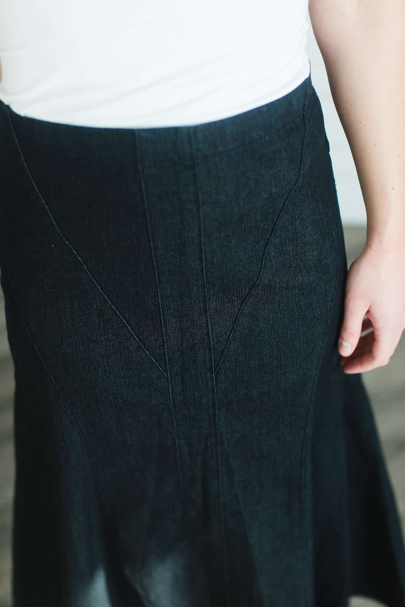 Ankle length flare black dye cotton side zip skirt.