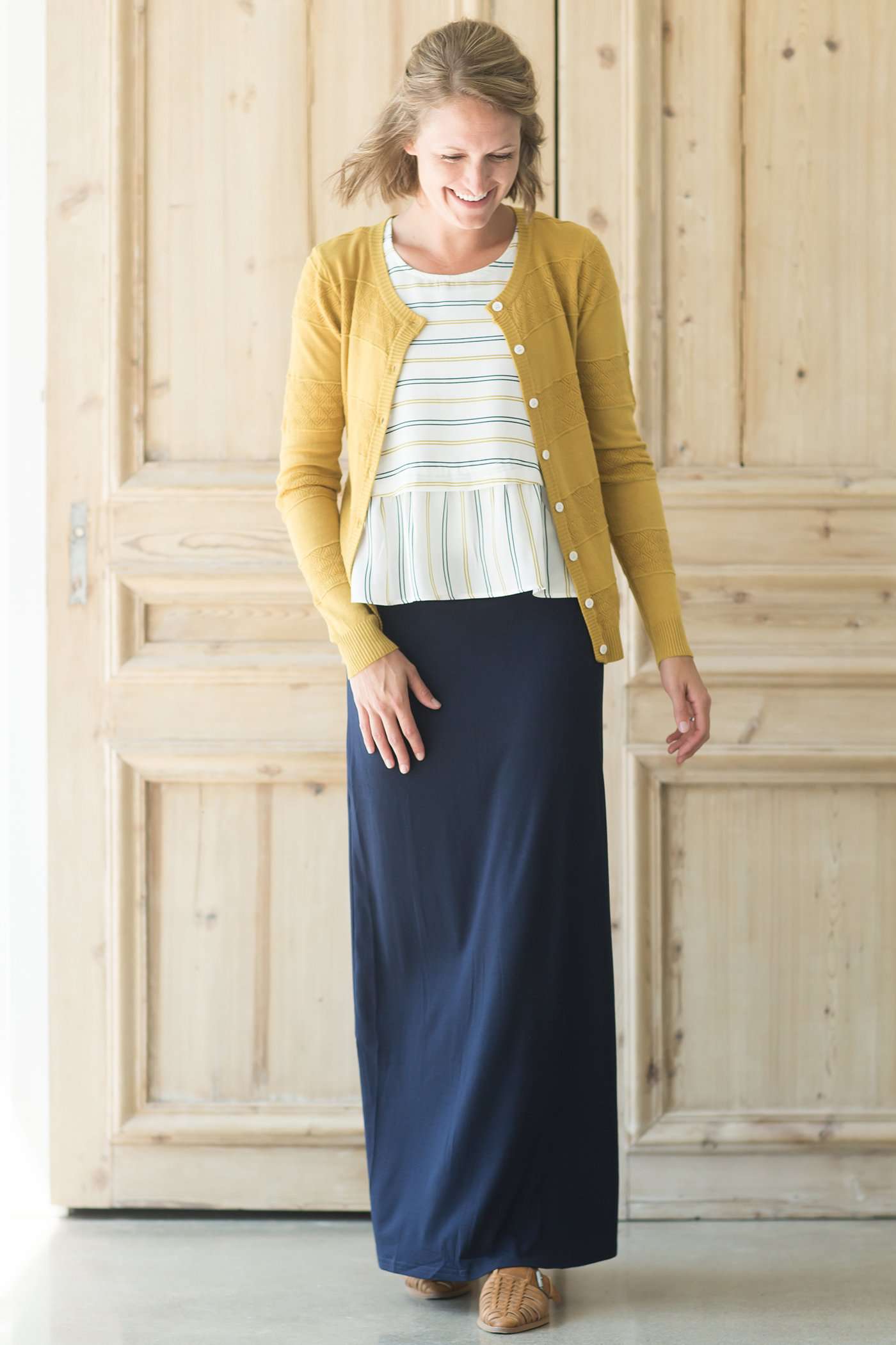 Women's button down detailed cardigan in mustard, dusty pink, ivory and gray.