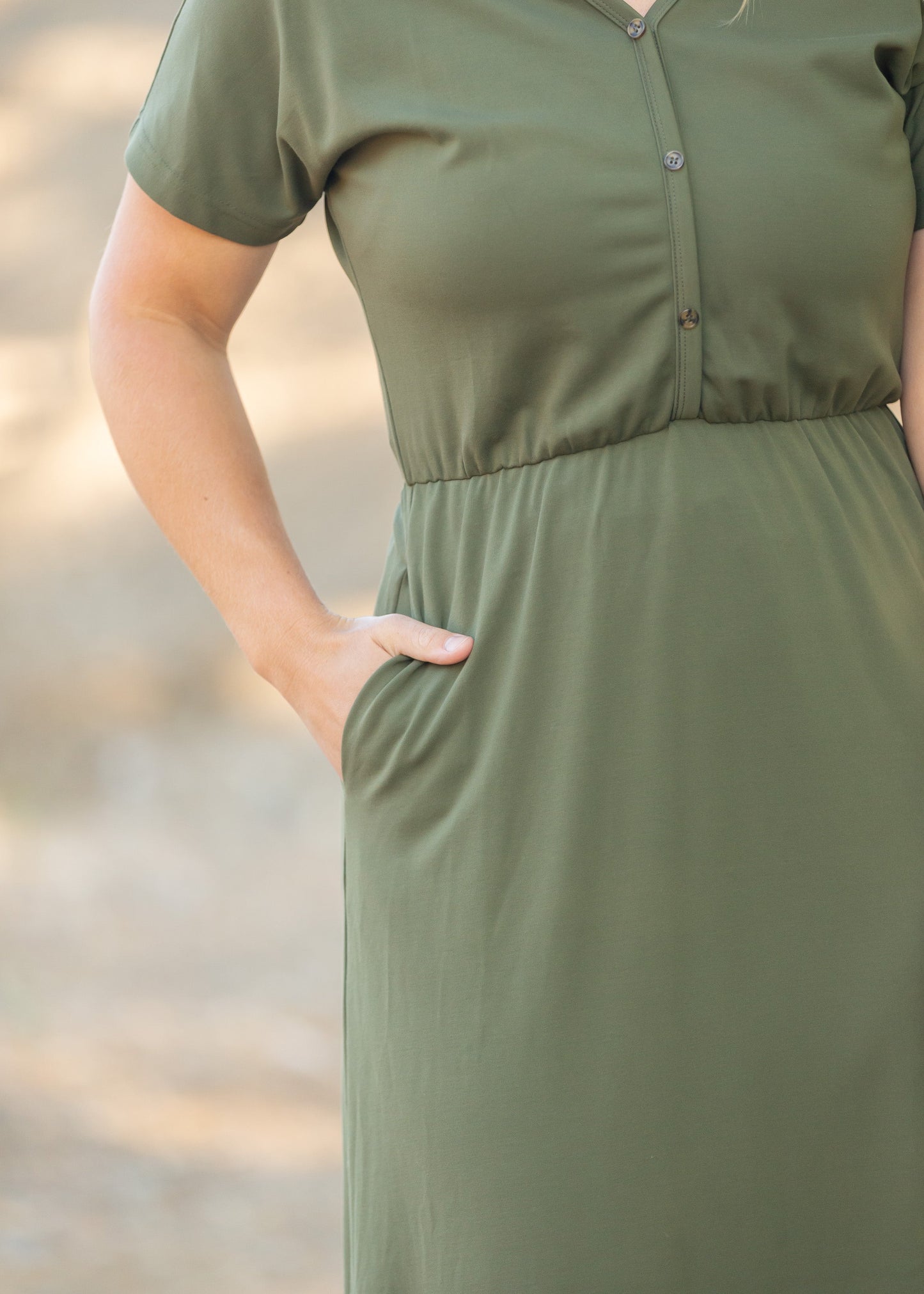 Made from an elevated ponte fabric, the Ella Cinched Waist Maxi Dress is an Inherit Design that will take you from season to season. There are non-functioning tortoise shell buttons down the front to ensure a modest fit. The top of the dress has a dolman fit and drop arms to keep you comfortable and give a flattering fit! The skirt of the dress has a slight a-line making this a super versatile dress that you can feel confident wearing.