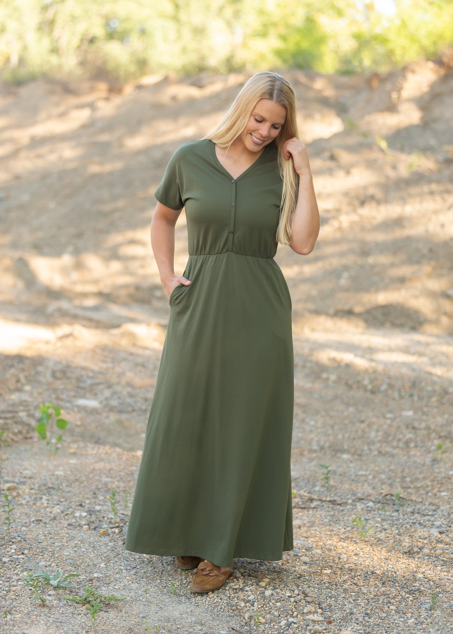 Made from an elevated ponte fabric, the Ella Cinched Waist Maxi Dress is an Inherit Design that will take you from season to season. There are non-functioning tortoise shell buttons down the front to ensure a modest fit. The top of the dress has a dolman fit and drop arms to keep you comfortable and give a flattering fit! The skirt of the dress has a slight a-line making this a super versatile dress that you can feel confident wearing.