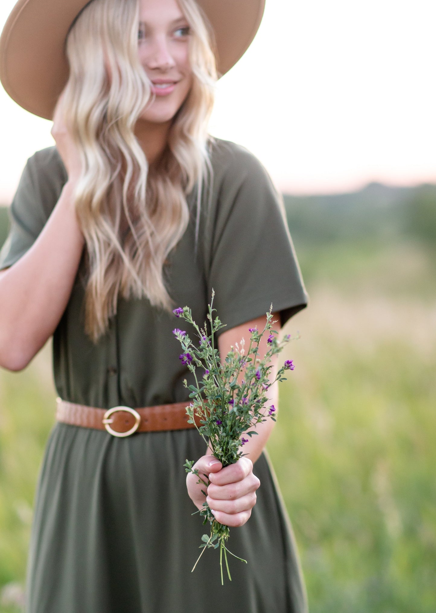 Made from an elevated ponte fabric, the Ella Cinched Waist Maxi Dress is an Inherit Design that will take you from season to season. There are non-functioning tortoise shell buttons down the front to ensure a modest fit. The top of the dress has a dolman fit and drop arms to keep you comfortable and give a flattering fit!