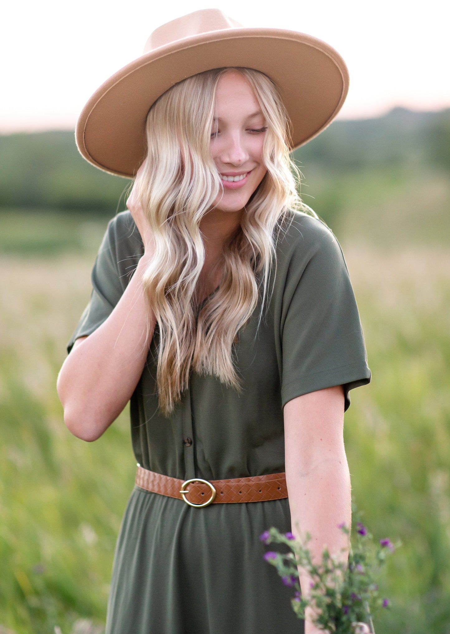 Made from an elevated ponte fabric, the Ella Cinched Waist Maxi Dress is an Inherit Design that will take you from season to season. There are non-functioning tortoise shell buttons down the front to ensure a modest fit. The top of the dress has a dolman fit and drop arms to keep you comfortable and give a flattering fit!