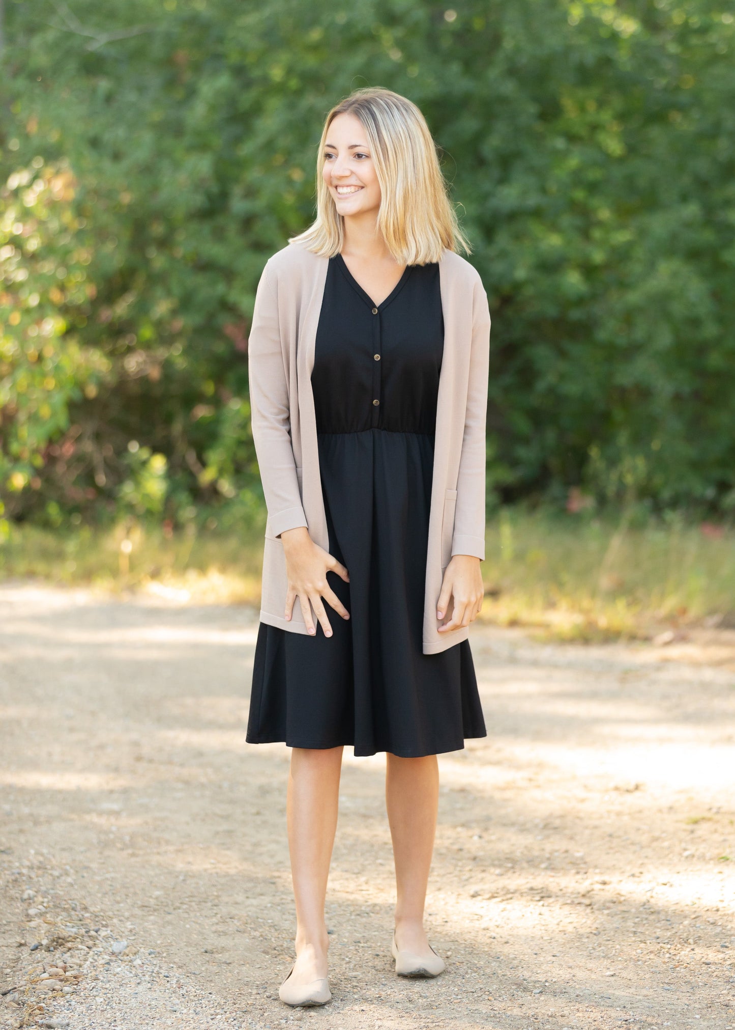 Made from an elevated ponte fabric, the Ella Cinched Waist Midi Dress is an Inherit Design that will take you from season to season. There are non-functioning tortoise shell buttons down the front to ensure a modest fit. The top of the dress has a dolman fit and drop arms to keep you comfortable and give a flattering fit! The skirt of the dress has a slight a-line making this a super versatile dress!
