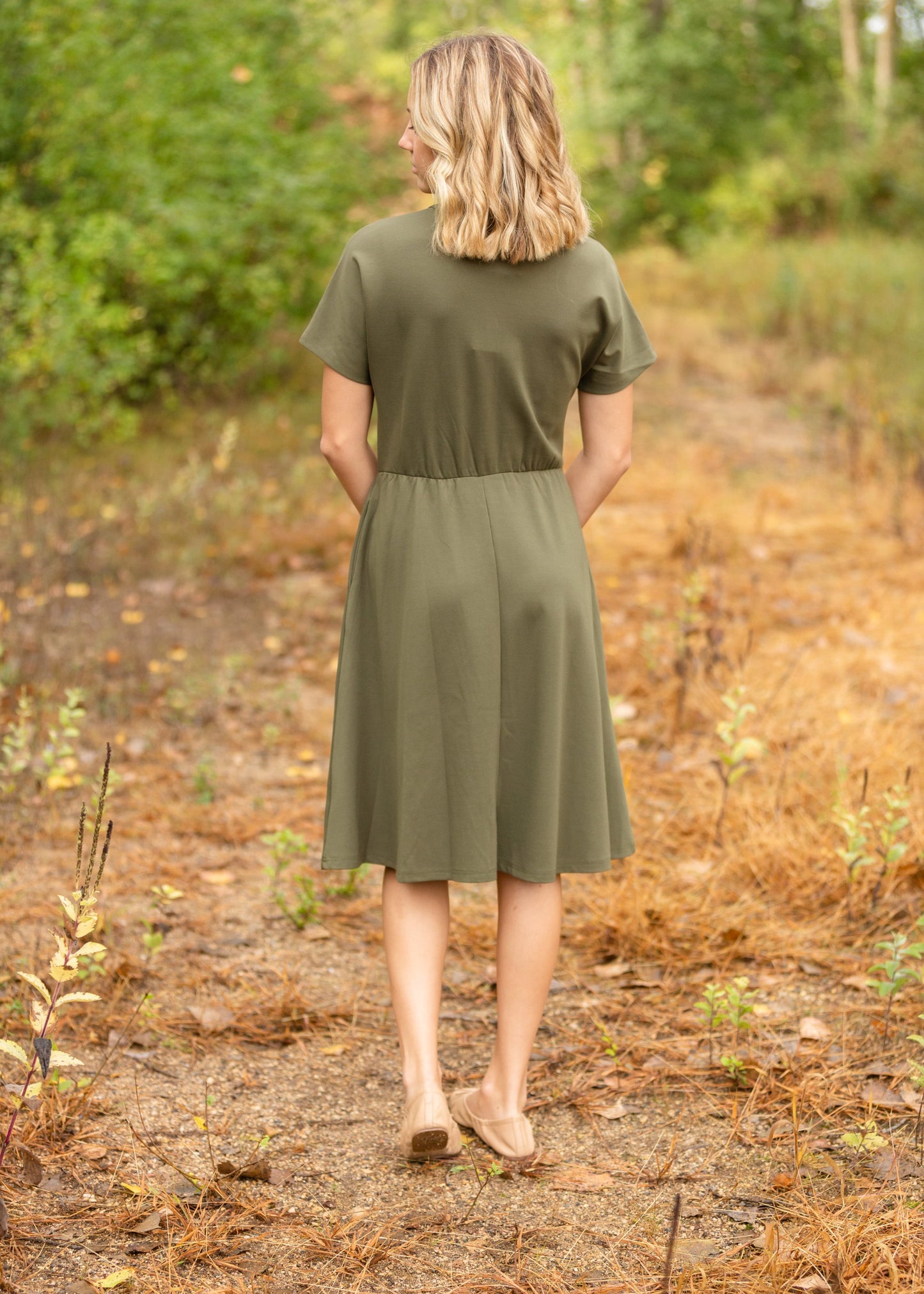 Made from an elevated ponte fabric, the Ella Cinched Waist Midi Dress is an Inherit Design that will take you from season to season. There are non-functioning tortoise shell buttons down the front to ensure a modest fit. The top of the dress has a dolman fit and drop arms to keep you comfortable and give a flattering fit! The skirt of the dress has a slight a-line making this a super versatile dress!