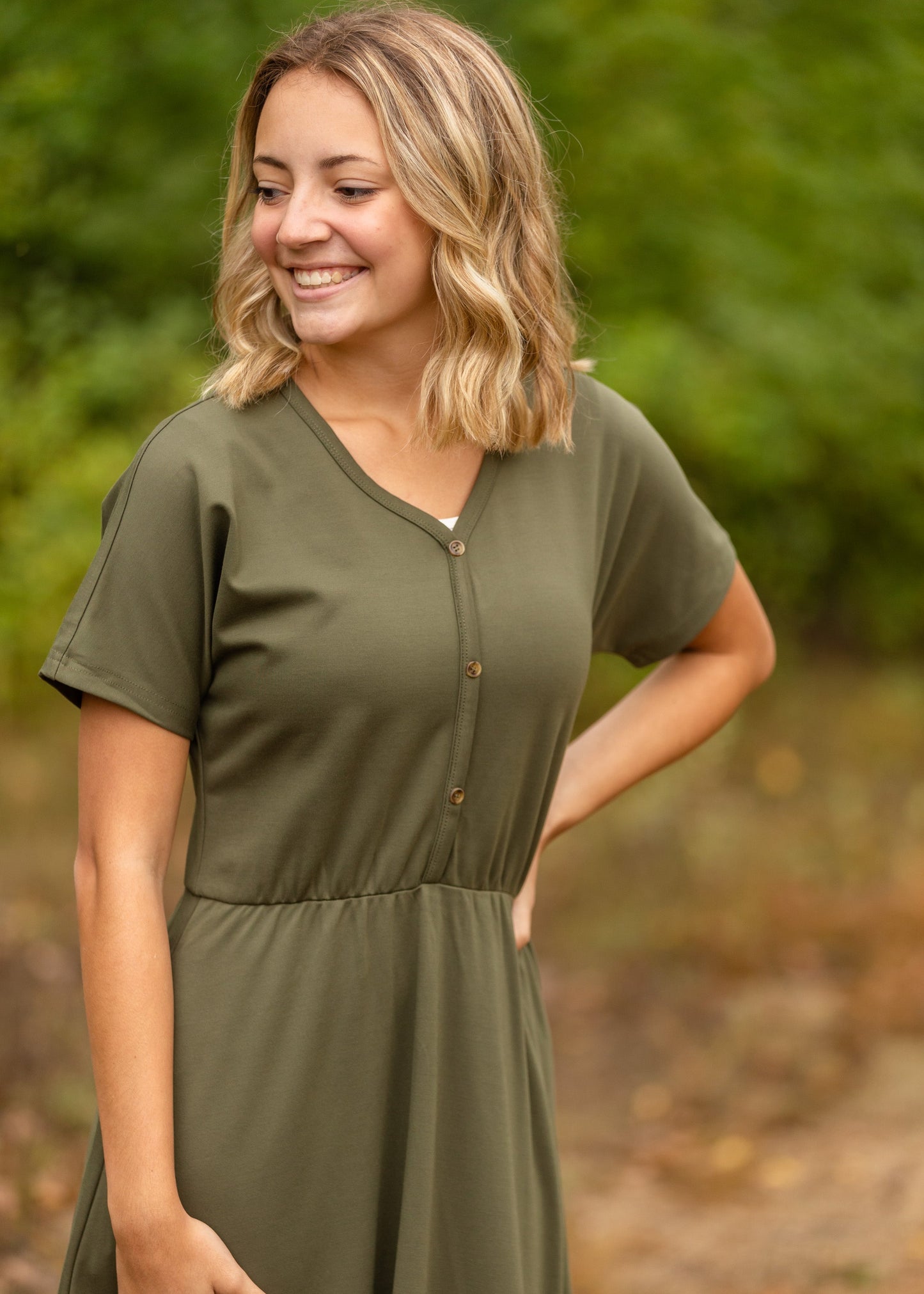 Made from an elevated ponte fabric, the Ella Cinched Waist Midi Dress is an Inherit Design that will take you from season to season. There are non-functioning tortoise shell buttons down the front to ensure a modest fit. The top of the dress has a dolman fit and drop arms to keep you comfortable and give a flattering fit! The skirt of the dress has a slight a-line making this a super versatile dress!