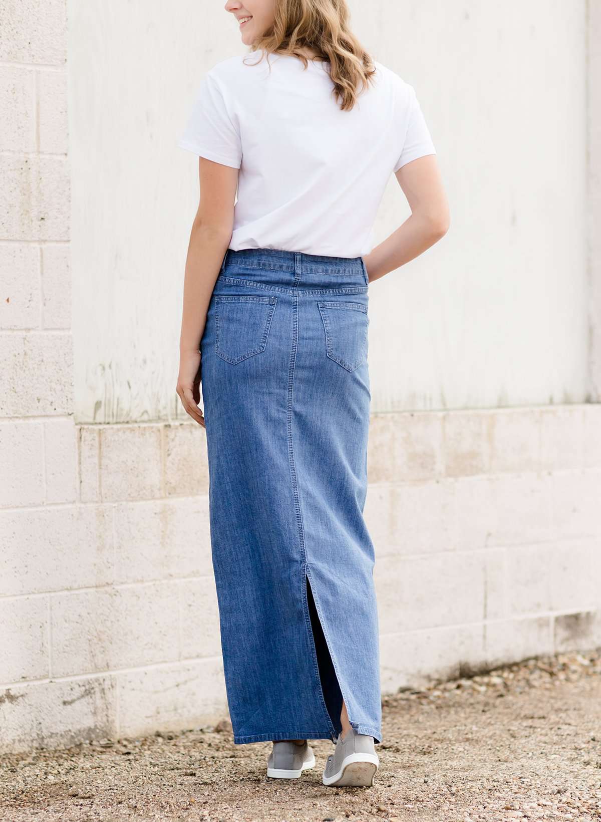 Women's modest long denim skirt with a slit in the back