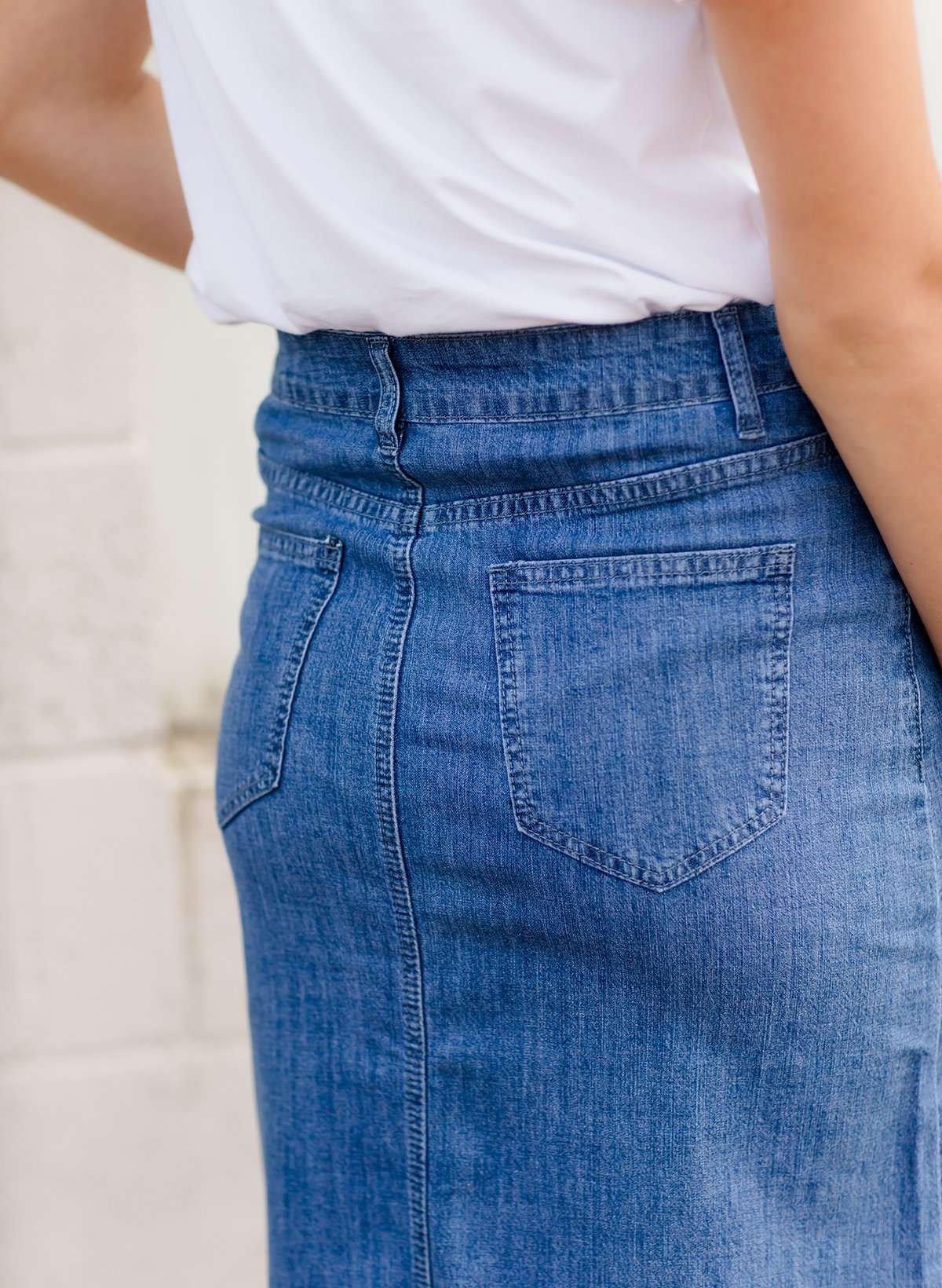 Women's modest long denim skirt with a slit in the back