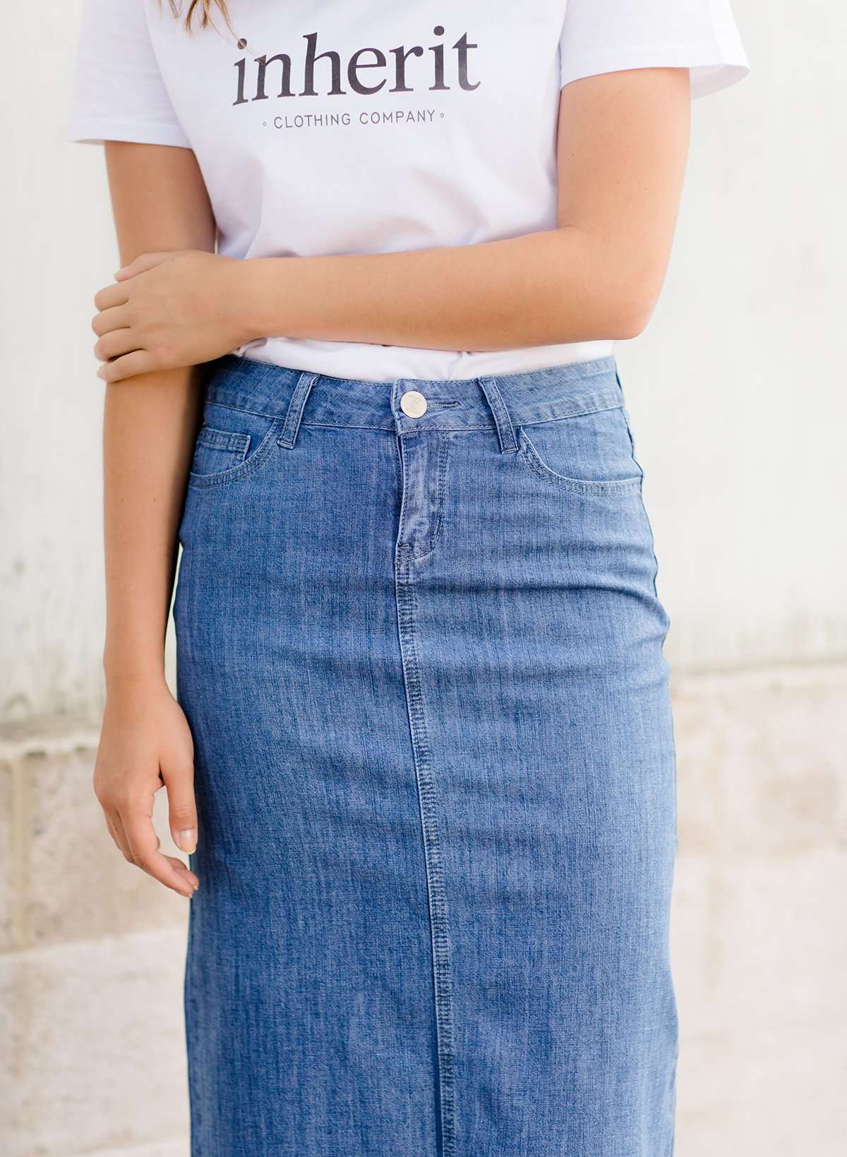 Women's modest long denim skirt with a slit in the back