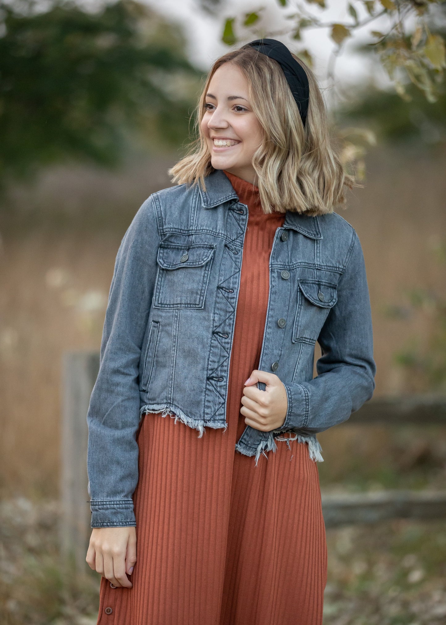 This Gray Fitted Jacket with Uneven Hem is easy to layer over all of your basics! Tailored in a gray cotton blend material, with fully functional front buttons, visible stitching, and a classic collar. The button details continue with at the two chest pockets perfect for holding all the things, and the cuffs also button! There is a raw frayed hem for elevated style! Layer this jacket over your favorite knit dress for classy casual looks all season long!