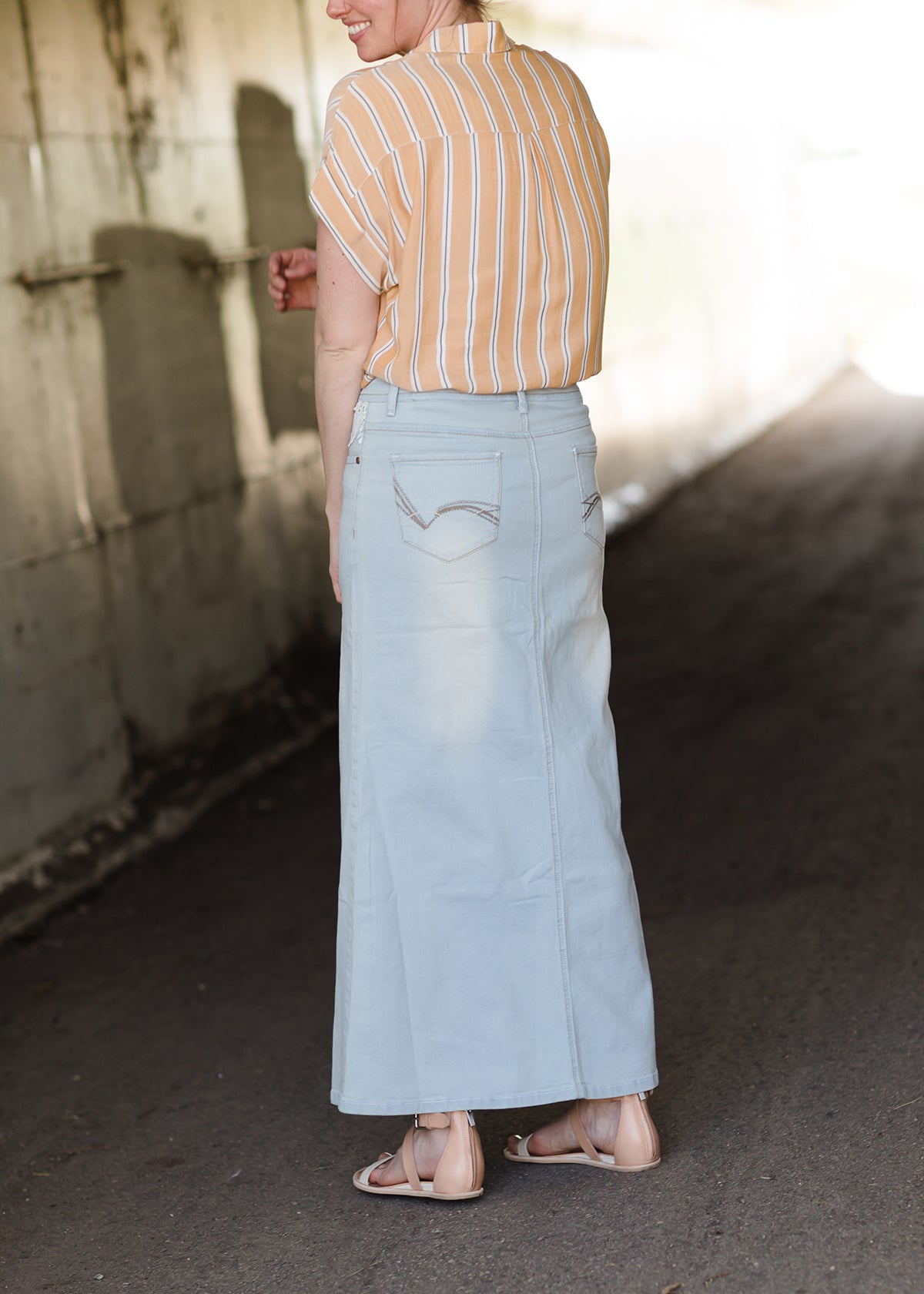 Women's long light wash modest denim-jean skirt.