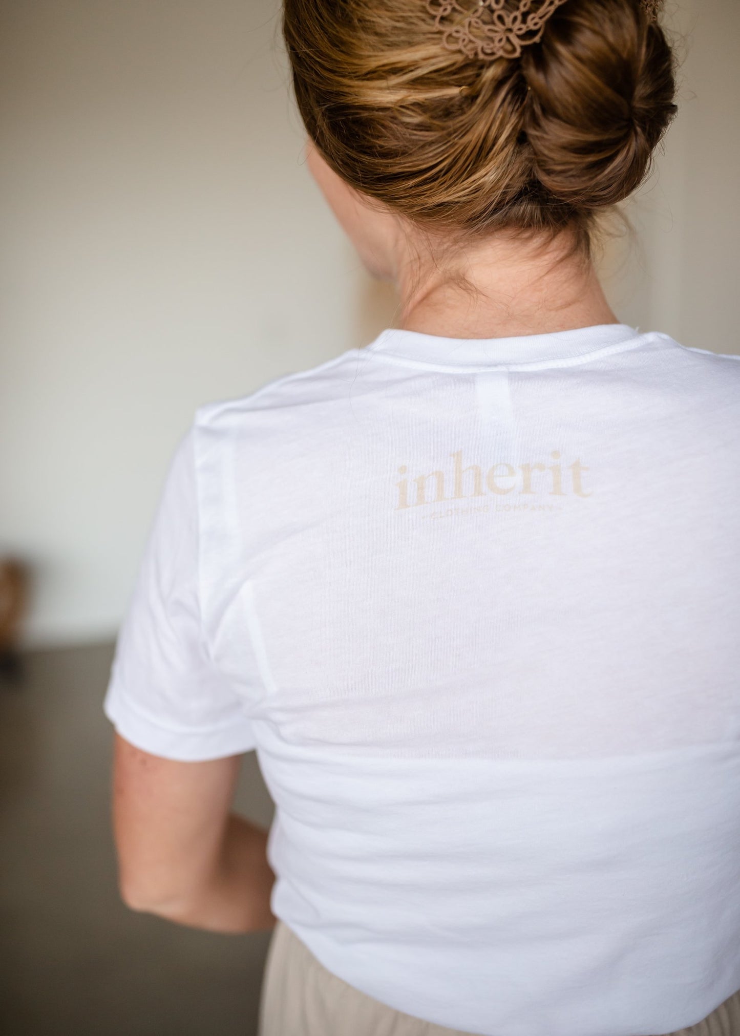 Inherit Exclusive Badge Graphic Tee Tops American Solutions