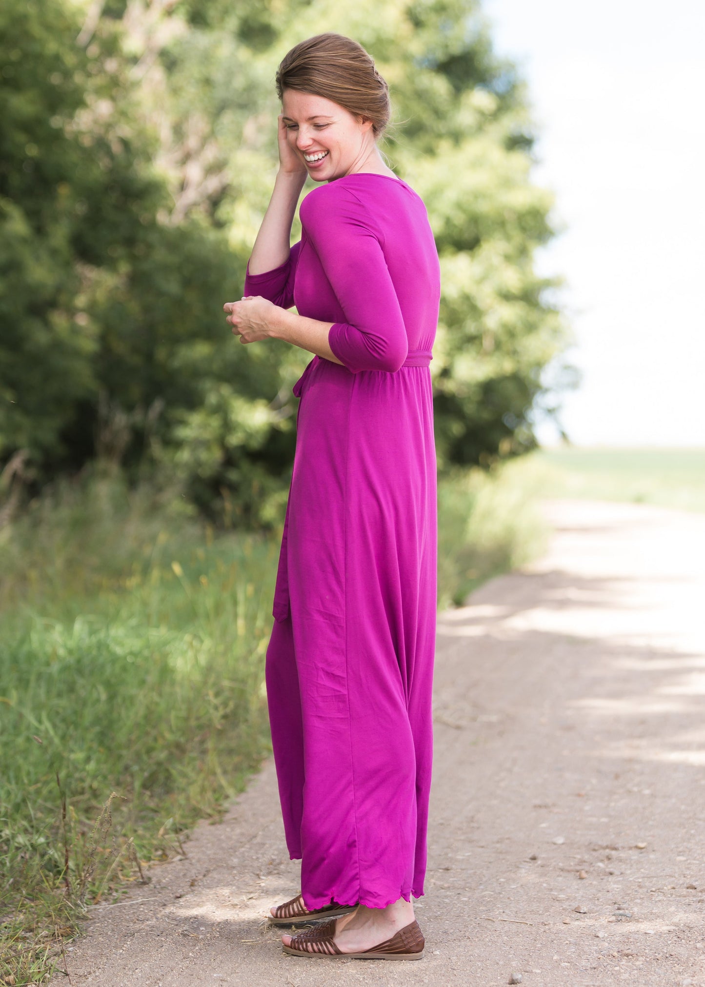 Women's long pink maxi dress that is fully lined, nursing friendly and comes with a belt