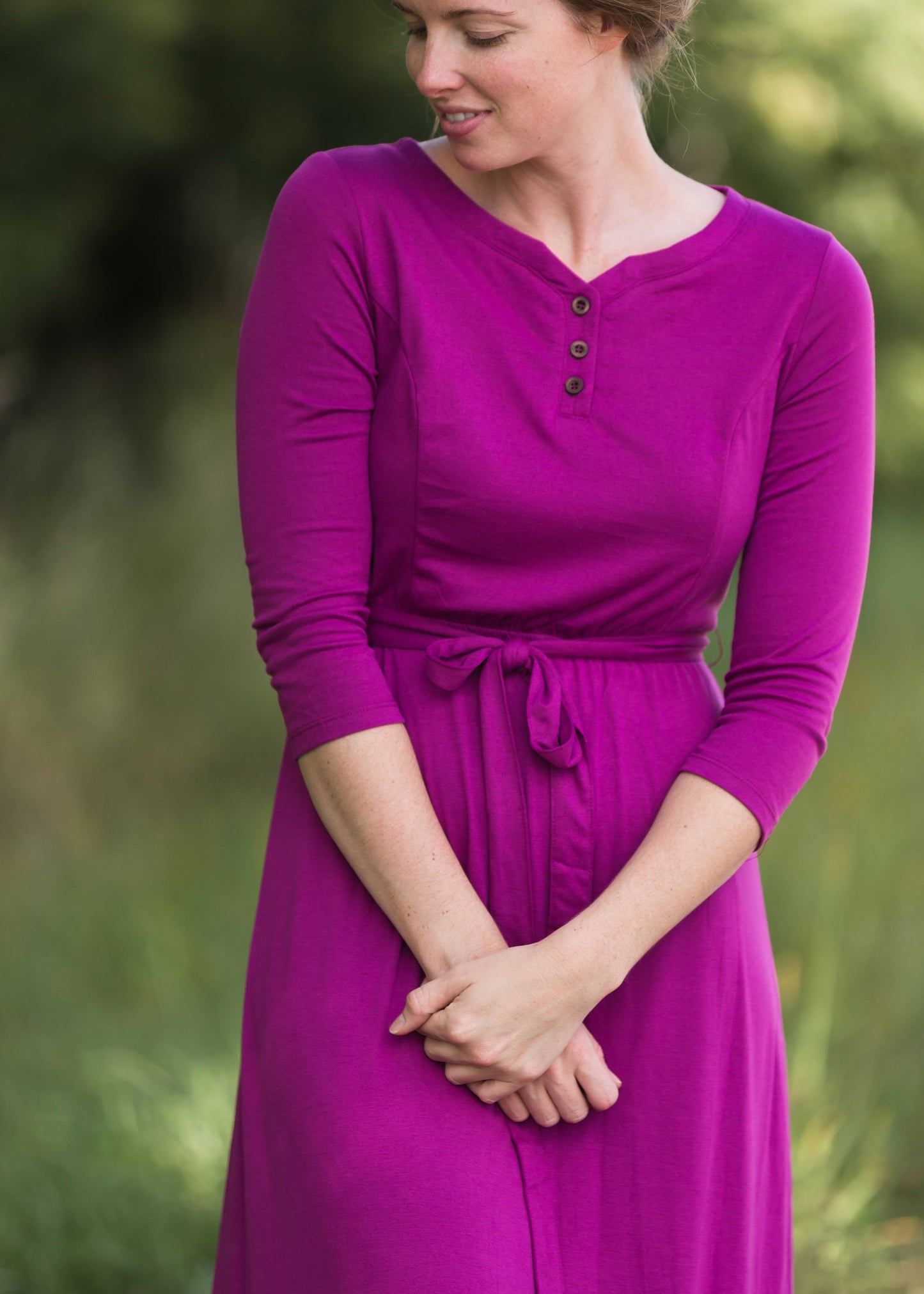 Women's long pink maxi dress that is fully lined, nursing friendly and comes with a belt