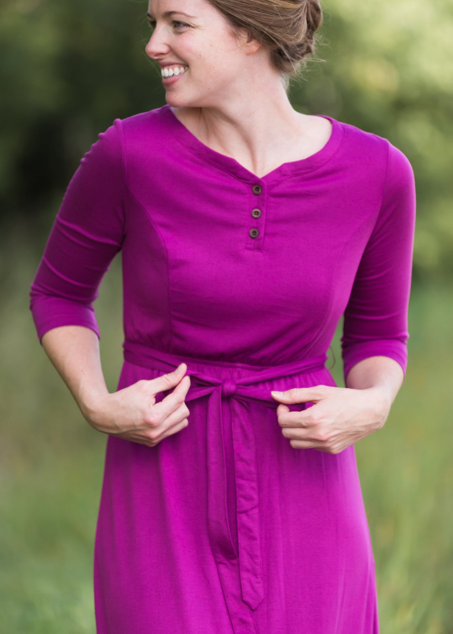 Women's long pink maxi dress that is fully lined, nursing friendly and comes with a belt