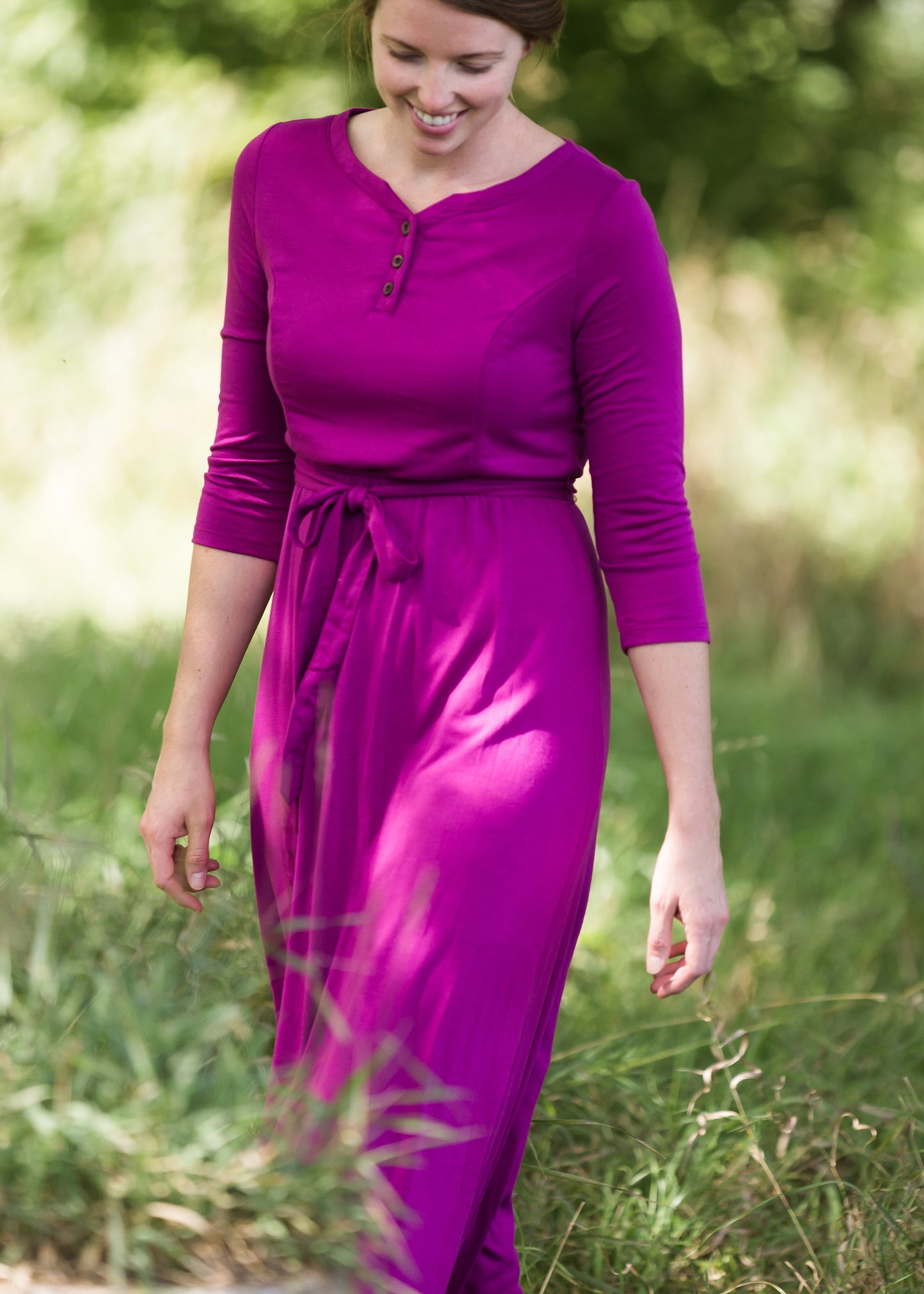 Women's long pink maxi dress that is fully lined, nursing friendly and comes with a belt