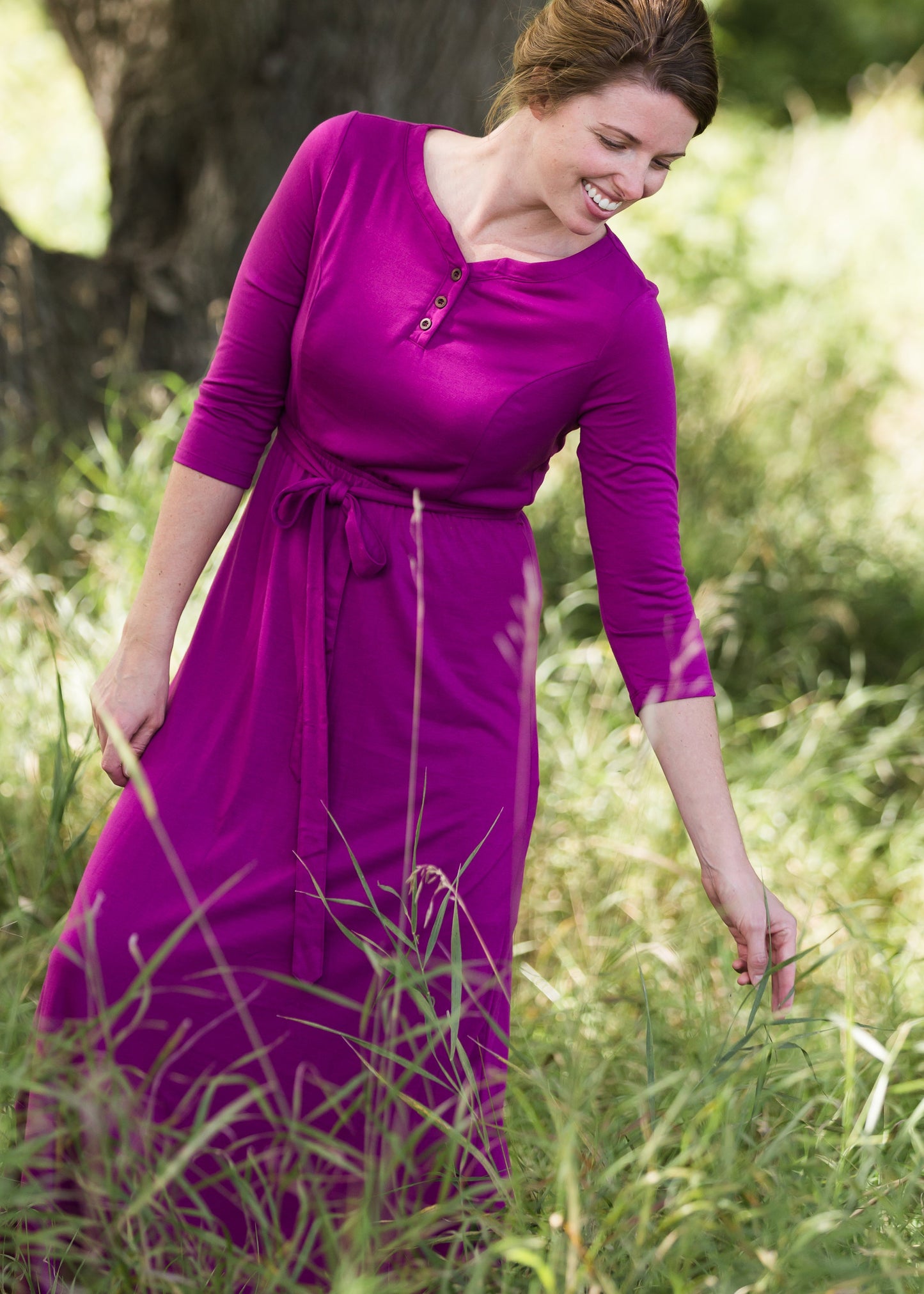 Women's long pink maxi dress that is fully lined, nursing friendly and comes with a belt