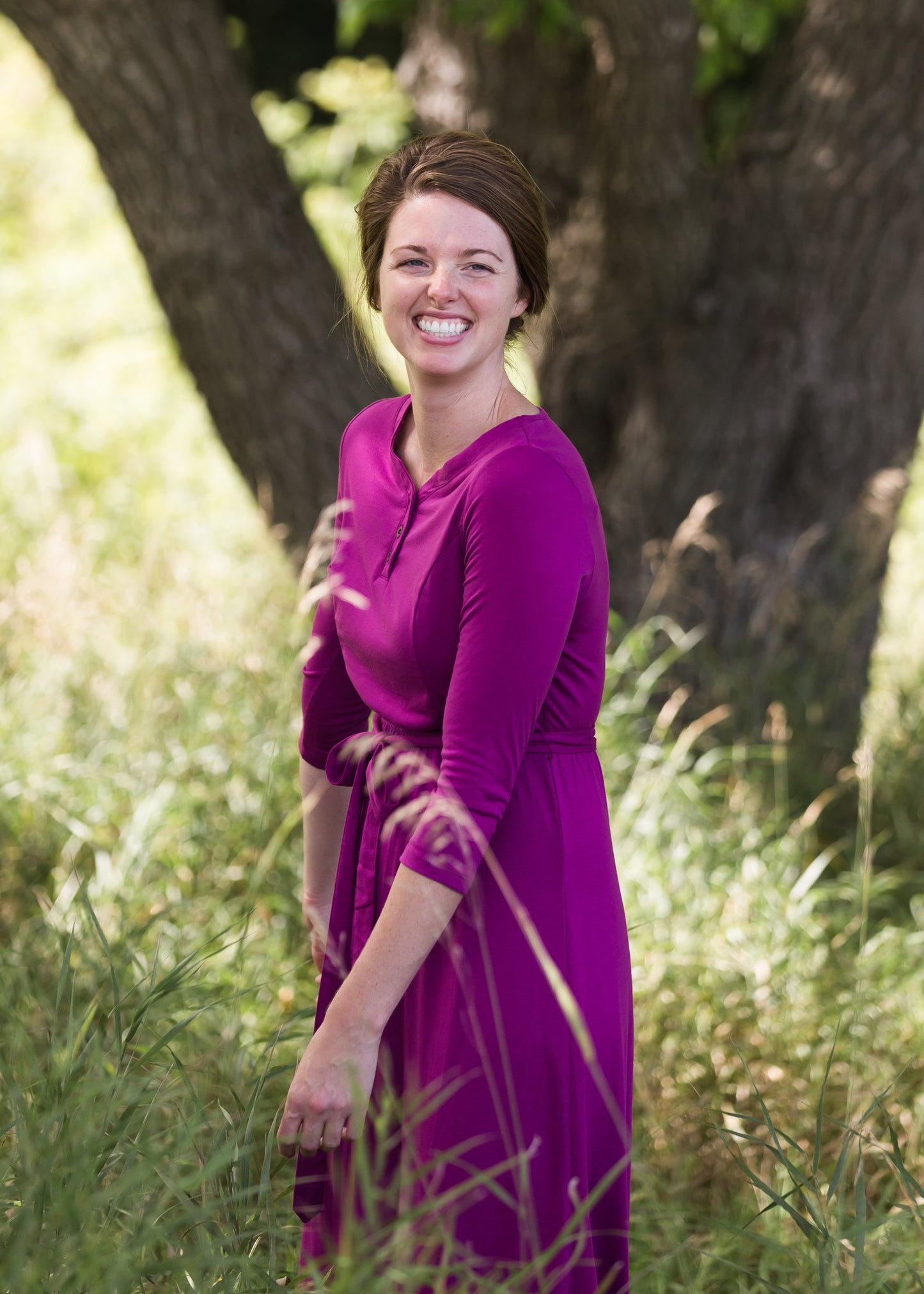 Women's long pink maxi dress that is fully lined, nursing friendly and comes with a belt