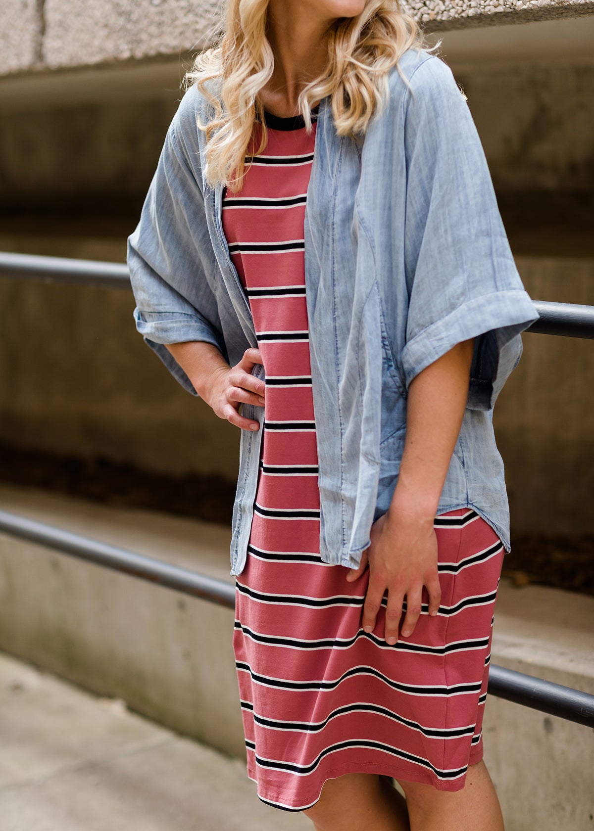 women's mauve midi dress with black and white stripes and side pockets