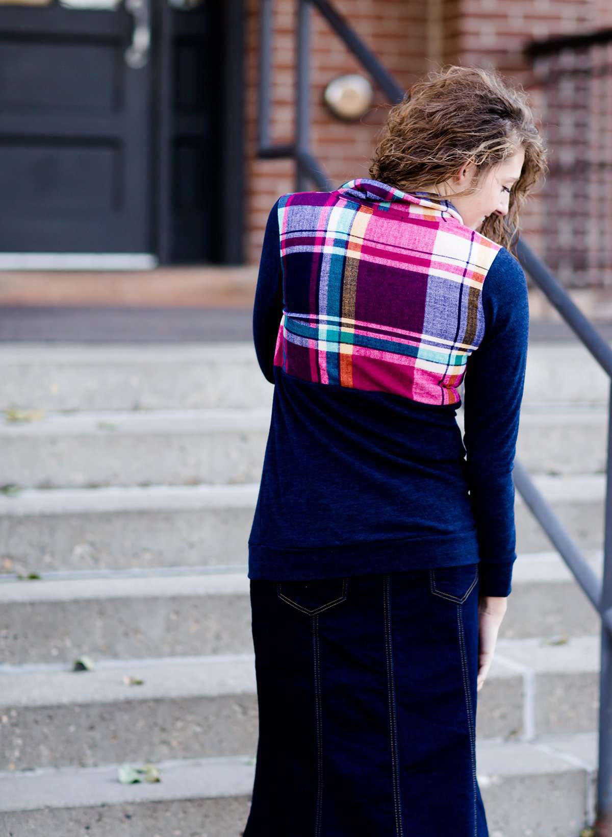This half zip pullover features a front pouch pocket and a beautiful color block print of fuchsia, teal and mustard! It also is a mommy and me style.