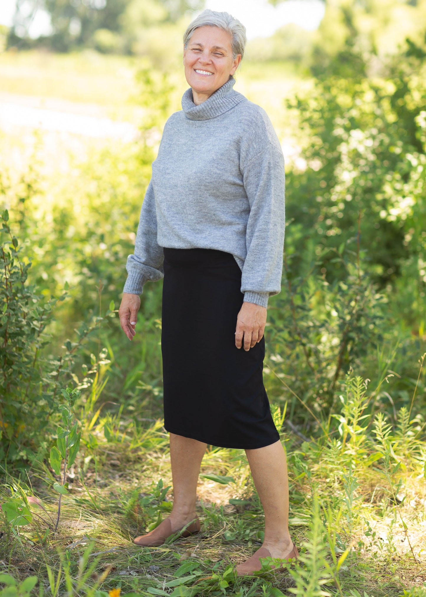 You will fall in love with the Quinn Midi Skirt! An Inherit exclusive, the Quinn is soft, sweet and always ready to go, as it is made of a fabric that is almost always wrinkle free! Say what?!! YEP!! No need to iron this one! The thick, stretch waist band is slimming and supportive along with no pockets giving this a no-bulk, super comfy fit. This modest skirt is ready for your 9-5 day at the office or lunch out with friends!